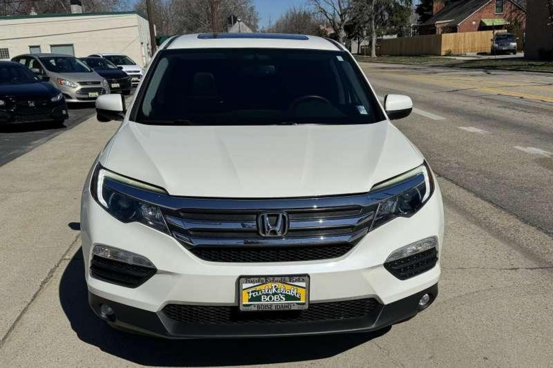 2017 White Diamond Pearl /Black Honda Pilot EX-L (5FNYF6H71HB) with an V6 3.5 Liter engine, Automatic transmission, located at 2304 W. Main St., Boise, ID, 83702, (208) 342-7777, 43.622105, -116.218658 - Amazing Condition! Hard To Find! Ready To Go! - Photo #3