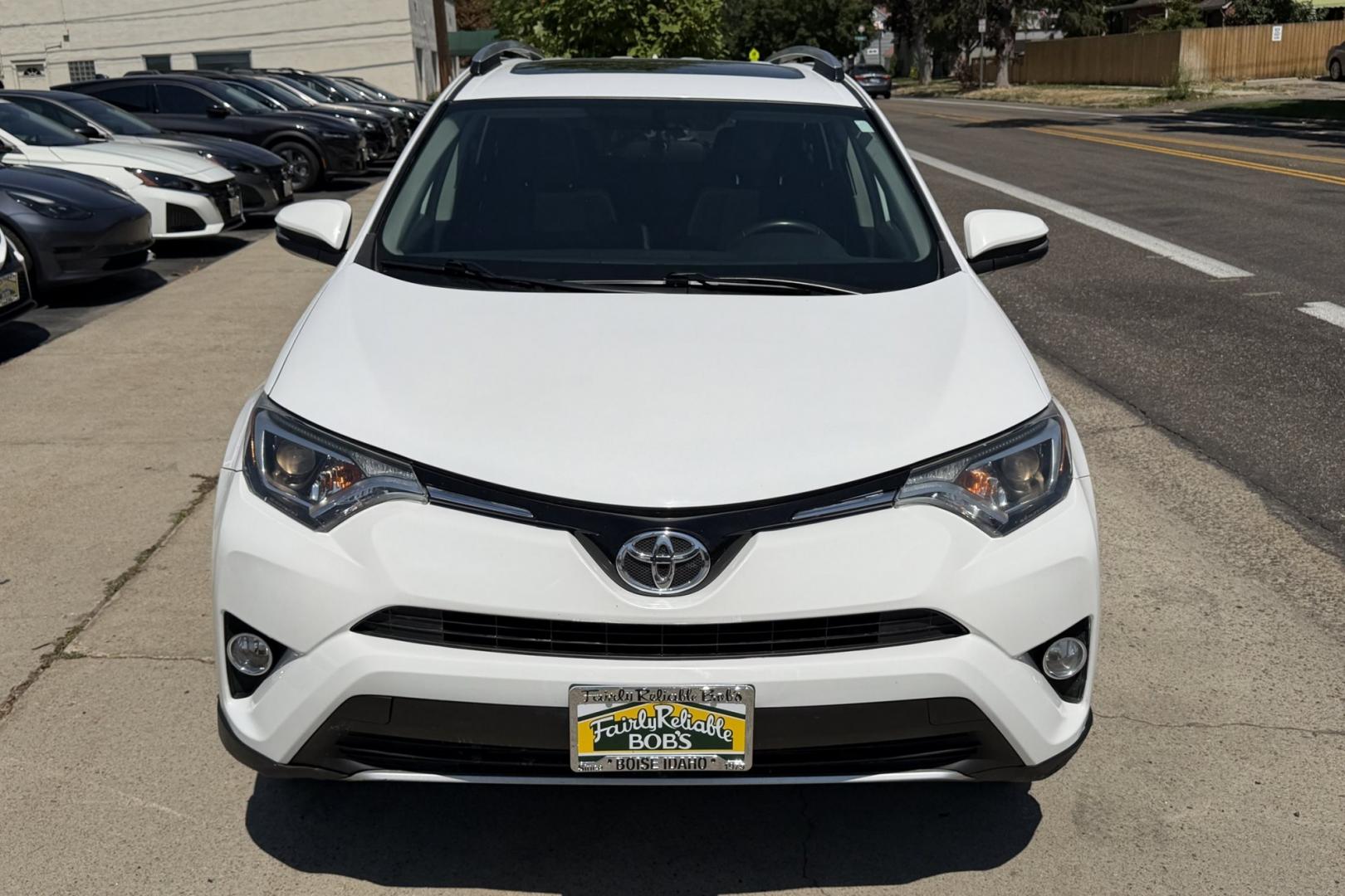 2016 Super White /Black Toyota RAV4 XLE (2T3RFREV3GW) with an 4 Cyl 2.5 Liter engine, Automatic transmission, located at 2304 W. Main St., Boise, ID, 83702, (208) 342-7777, 43.622105, -116.218658 - Sunroof! Clean And Ready To Go!- Photo#3