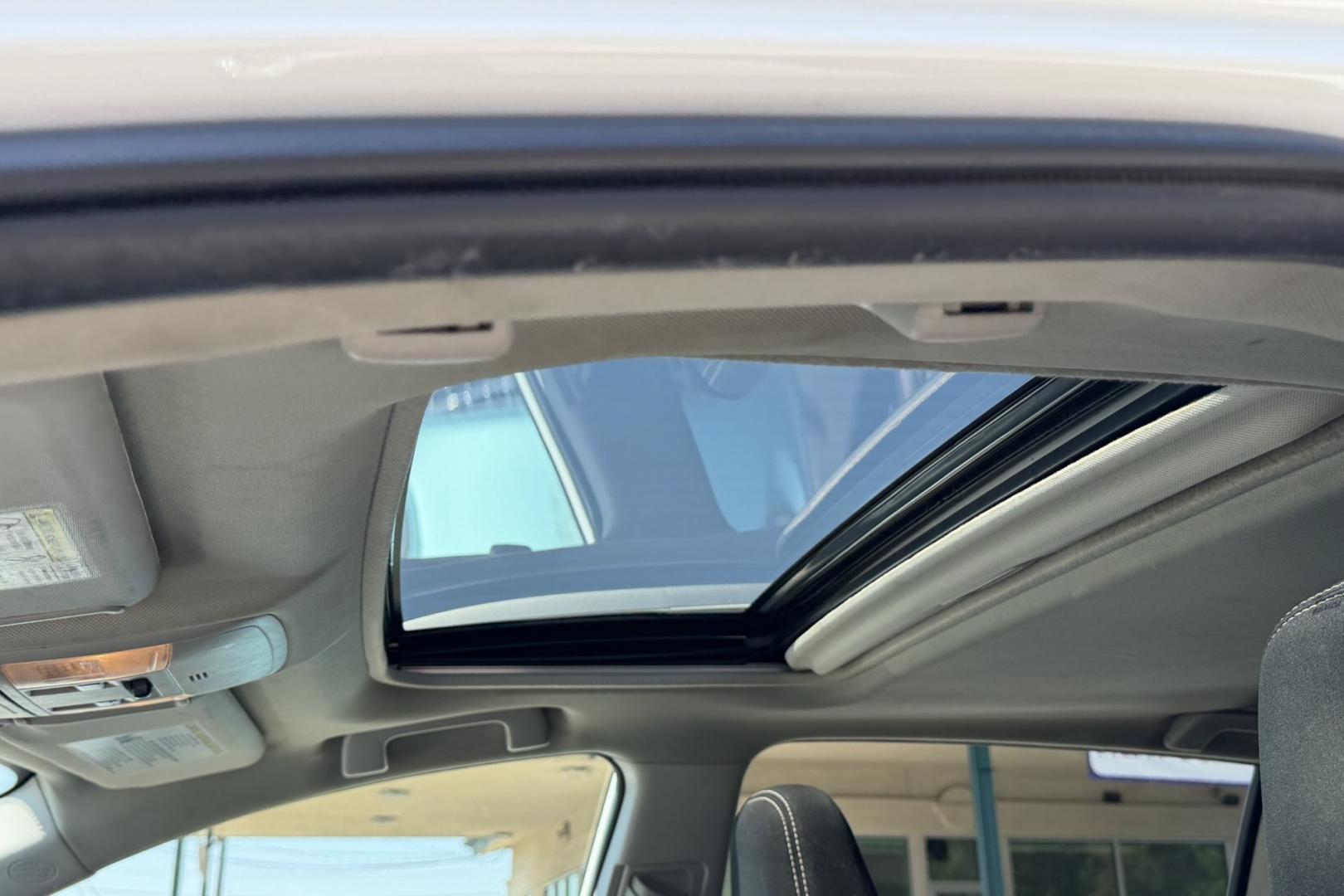 2016 Super White /Black Toyota RAV4 XLE (2T3RFREV3GW) with an 4 Cyl 2.5 Liter engine, Automatic transmission, located at 2304 W. Main St., Boise, ID, 83702, (208) 342-7777, 43.622105, -116.218658 - Sunroof! Clean And Ready To Go!- Photo#4