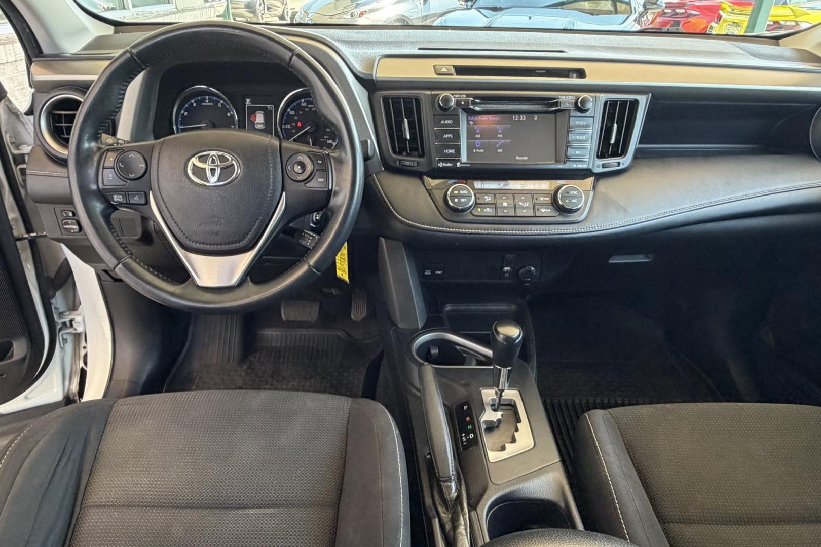 2016 Super White /Black Toyota RAV4 XLE (2T3RFREV3GW) with an 4 Cyl 2.5 Liter engine, Automatic transmission, located at 2304 W. Main St., Boise, ID, 83702, (208) 342-7777, 43.622105, -116.218658 - Sunroof! Clean And Ready To Go!- Photo#11