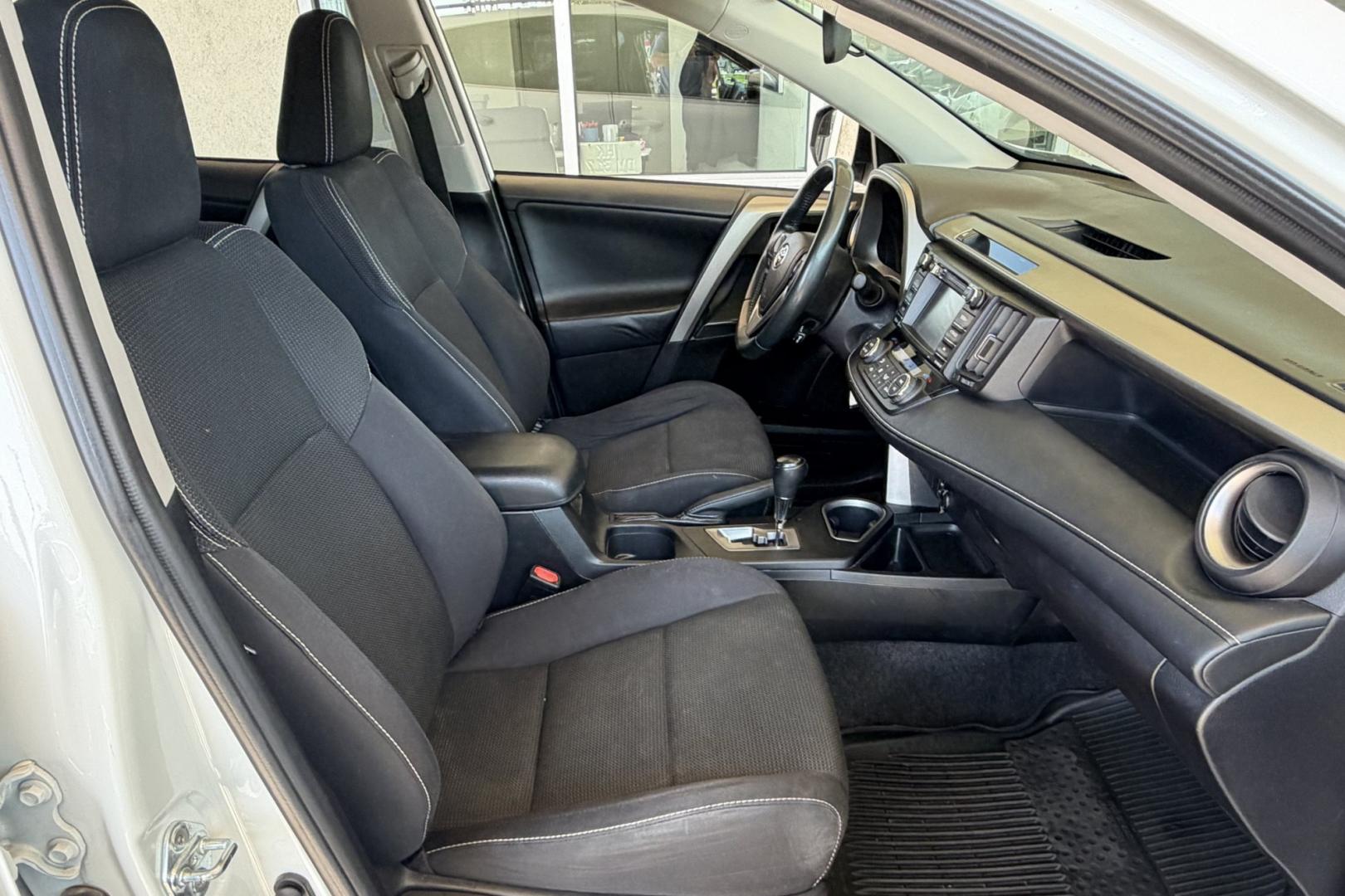 2016 Super White /Black Toyota RAV4 XLE (2T3RFREV3GW) with an 4 Cyl 2.5 Liter engine, Automatic transmission, located at 2304 W. Main St., Boise, ID, 83702, (208) 342-7777, 43.622105, -116.218658 - Sunroof! Clean And Ready To Go!- Photo#16