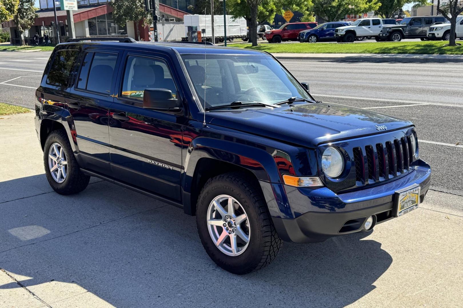 2017 True Blue /Tan Jeep Patriot (1C4NJRBB0HD) with an 4 Cyl 2.4 Liter engine, Automatic transmission, located at 2304 W. Main St., Boise, ID, 83702, (208) 342-7777, 43.622105, -116.218658 - Ready For Adventure! Trades Welcome! - Photo#2