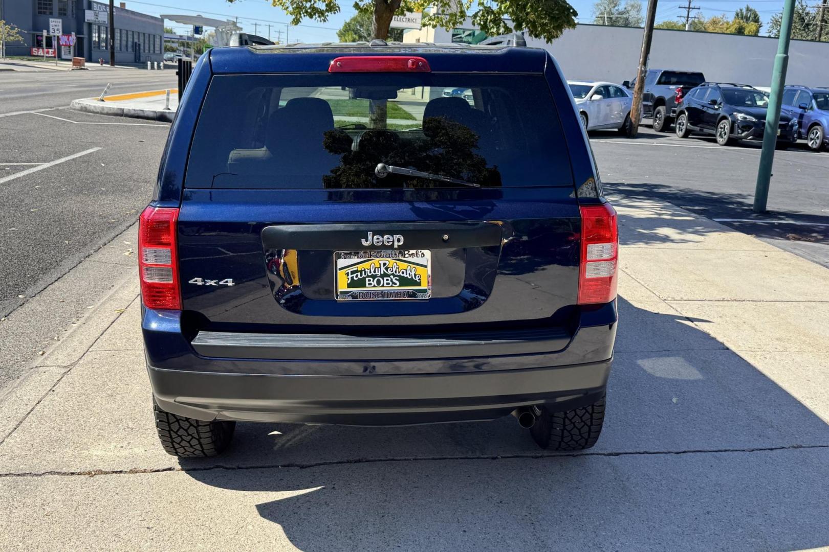 2017 True Blue /Tan Jeep Patriot (1C4NJRBB0HD) with an 4 Cyl 2.4 Liter engine, Automatic transmission, located at 2304 W. Main St., Boise, ID, 83702, (208) 342-7777, 43.622105, -116.218658 - Ready For Adventure! Trades Welcome! - Photo#1