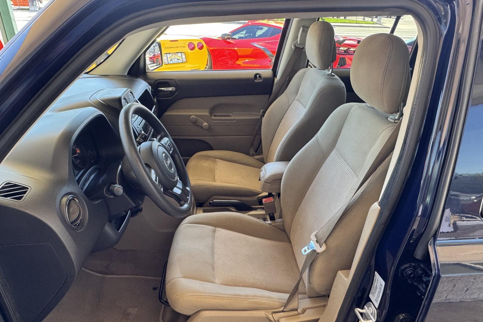 2017 True Blue /Tan Jeep Patriot (1C4NJRBB0HD) with an 4 Cyl 2.4 Liter engine, Automatic transmission, located at 2304 W. Main St., Boise, ID, 83702, (208) 342-7777, 43.622105, -116.218658 - Ready For Adventure! Trades Welcome! - Photo#6