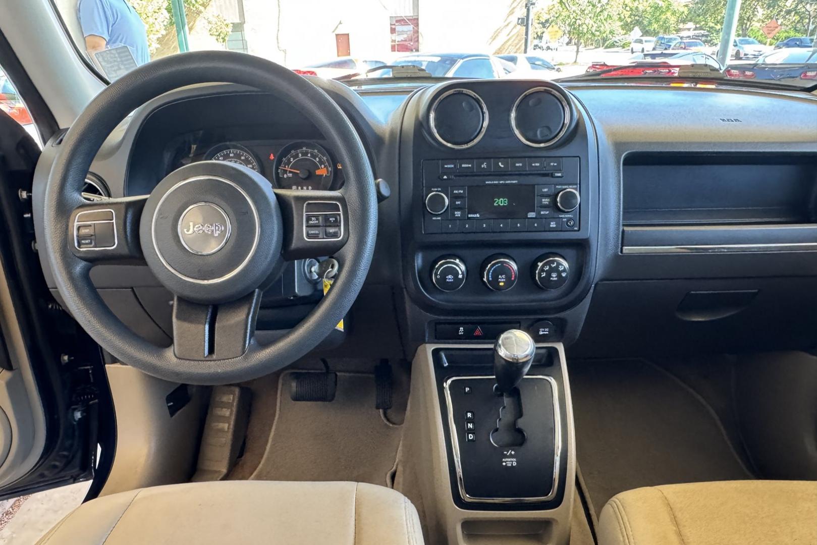 2017 True Blue /Tan Jeep Patriot (1C4NJRBB0HD) with an 4 Cyl 2.4 Liter engine, Automatic transmission, located at 2304 W. Main St., Boise, ID, 83702, (208) 342-7777, 43.622105, -116.218658 - Ready For Adventure! Trades Welcome! - Photo#8