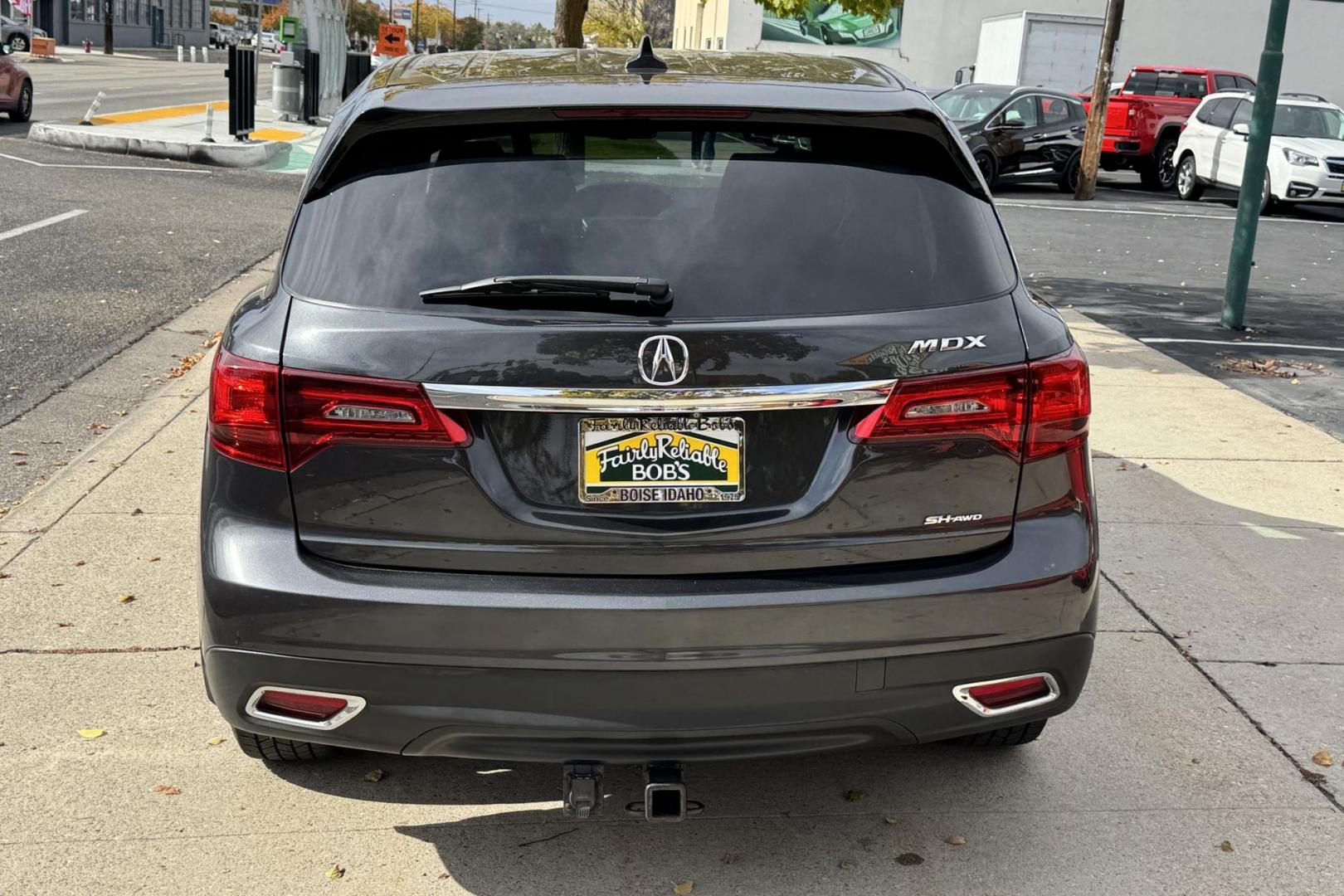 2015 Graphite Luster Metallic /Graystone Acura MDX SH-AWD (5FRYD4H29FB) with an V6 3.5 Liter engine, Automatic 6 Speed transmission, located at 2304 W. Main St., Boise, ID, 83702, (208) 342-7777, 43.622105, -116.218658 - 3rd Row Seating! Comfortable Ride! - Photo#1