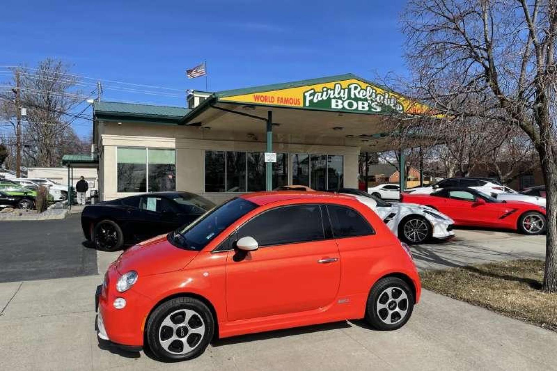 2015 Electric Orange Tri-Coat Pearlcoat /Black Fiat 500e (3C3CFFGE4FT) with an EV engine, Automatic transmission, located at 2304 W. Main St., Boise, ID, 83702, (208) 342-7777, 43.622105, -116.218658 - Financing Available O.A.C. - Photo #0