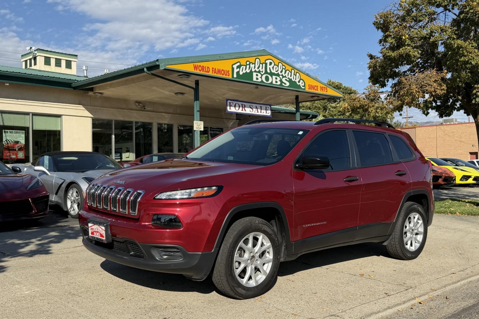 2017 Deep Cherry Red /Black Jeep Cherokee Sport (1C4PJMAB3HW) with an 4 Cyl 2.4 Liter engine, Automatic 9 Speed transmission, located at 2304 W. Main St., Boise, ID, 83702, (208) 342-7777, 43.622105, -116.218658 - Affordable 4x4!- Photo#0