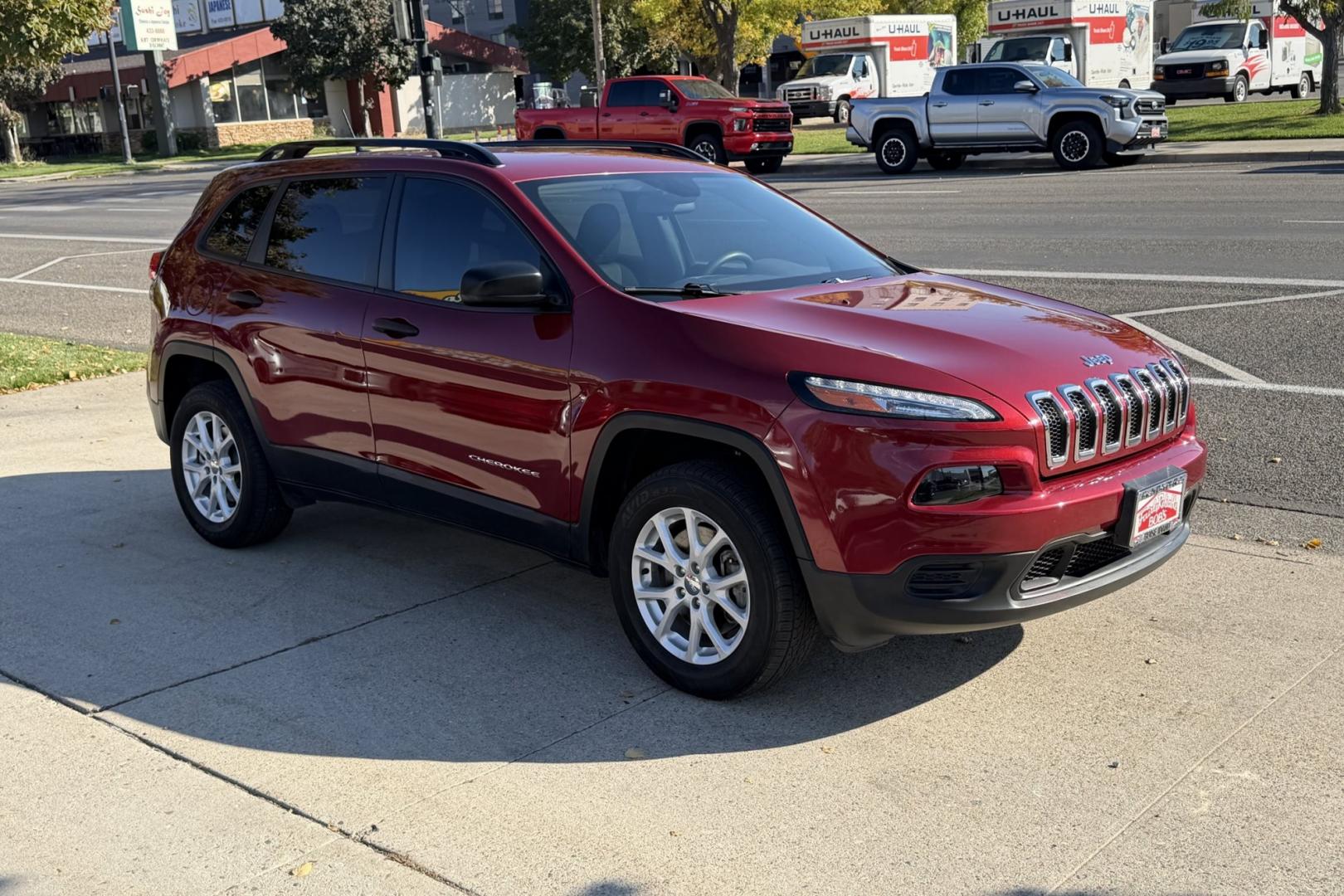 2017 Deep Cherry Red /Black Jeep Cherokee Sport (1C4PJMAB3HW) with an 4 Cyl 2.4 Liter engine, Automatic 9 Speed transmission, located at 2304 W. Main St., Boise, ID, 83702, (208) 342-7777, 43.622105, -116.218658 - Affordable 4x4!- Photo#2