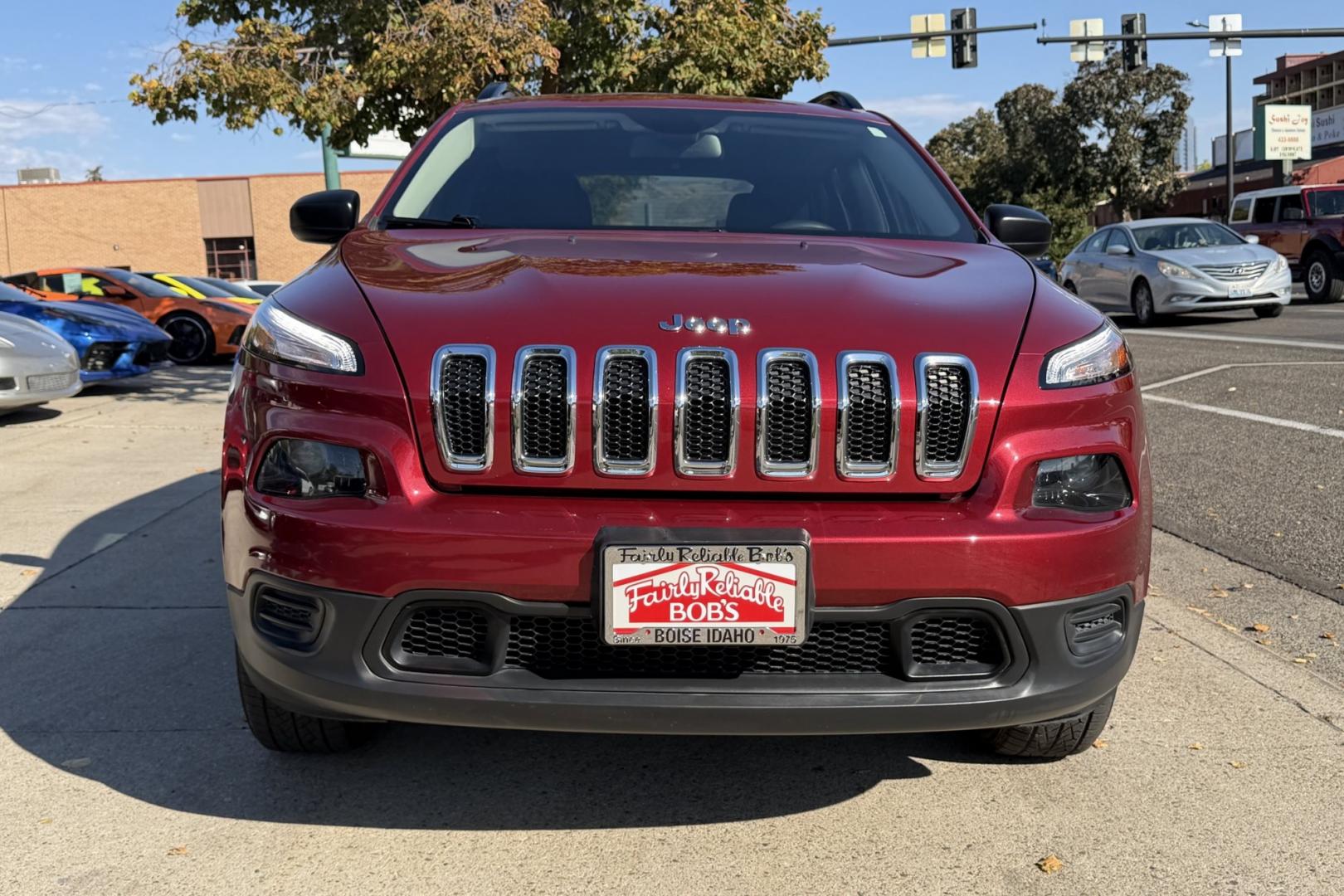 2017 Deep Cherry Red /Black Jeep Cherokee Sport (1C4PJMAB3HW) with an 4 Cyl 2.4 Liter engine, Automatic 9 Speed transmission, located at 2304 W. Main St., Boise, ID, 83702, (208) 342-7777, 43.622105, -116.218658 - Affordable 4x4!- Photo#3