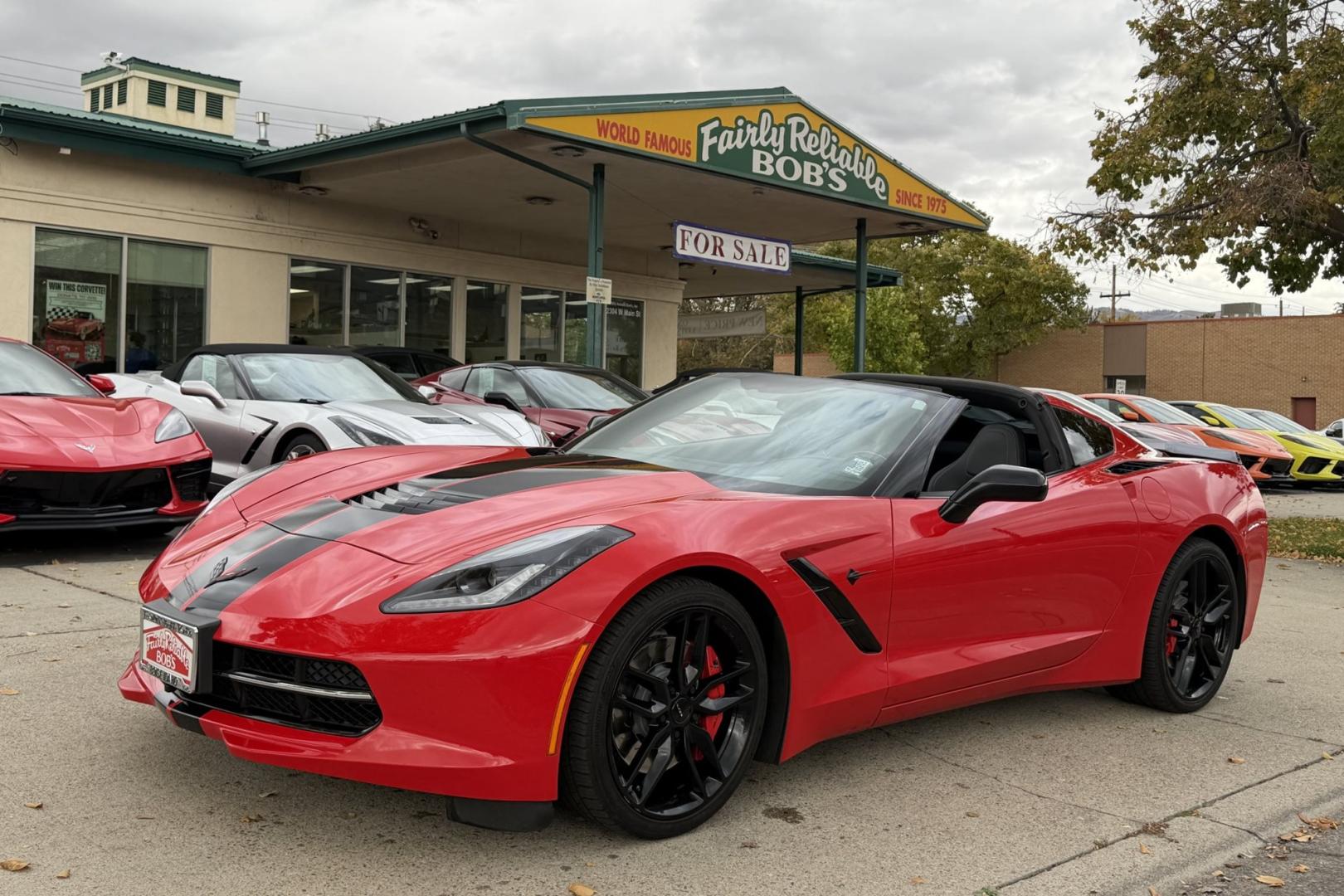 2015 Torch Red /Black Chevrolet Corvette Stingray 2LT Z/51 (1G1YK2D78F5) with an V8 6.2 Liter engine, Automatic 8 Speed transmission, located at 2304 W. Main St., Boise, ID, 83702, (208) 342-7777, 43.622105, -116.218658 - Super low mileage Z/51 coupe in stunning Torch Red!- Photo#0