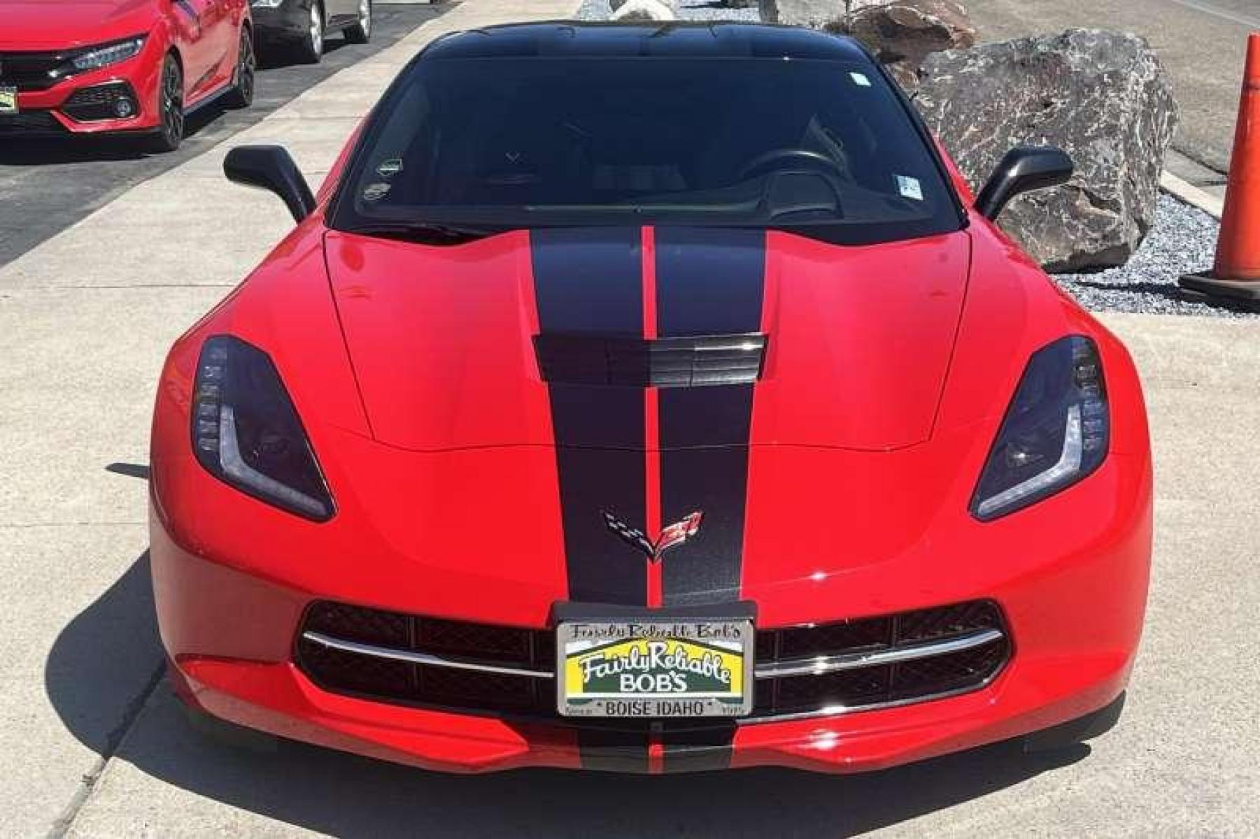2015 Torch Red /Black Chevrolet Corvette Stingray 2LT Z51 Coupe (1G1YK2D78F5) with an V8 6.2 Liter engine, Automatic transmission, located at 2304 W. Main St., Boise, ID, 83702, (208) 342-7777, 43.622105, -116.218658 - Super low mileage Z51 coupe in stunning Torch Red! - Photo #1