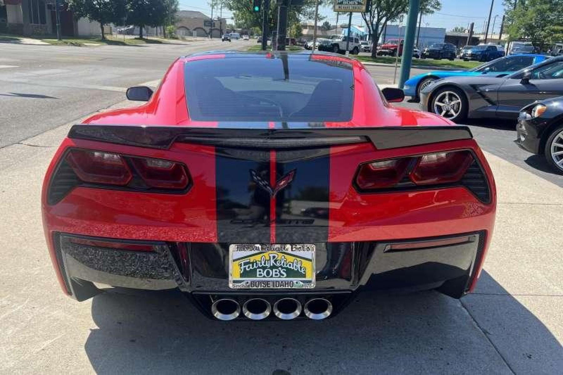 2015 Torch Red /Black Chevrolet Corvette Stingray 2LT Z51 Coupe (1G1YK2D78F5) with an V8 6.2 Liter engine, Automatic transmission, located at 2304 W. Main St., Boise, ID, 83702, (208) 342-7777, 43.622105, -116.218658 - Super low mileage Z51 coupe in stunning Torch Red! - Photo #3