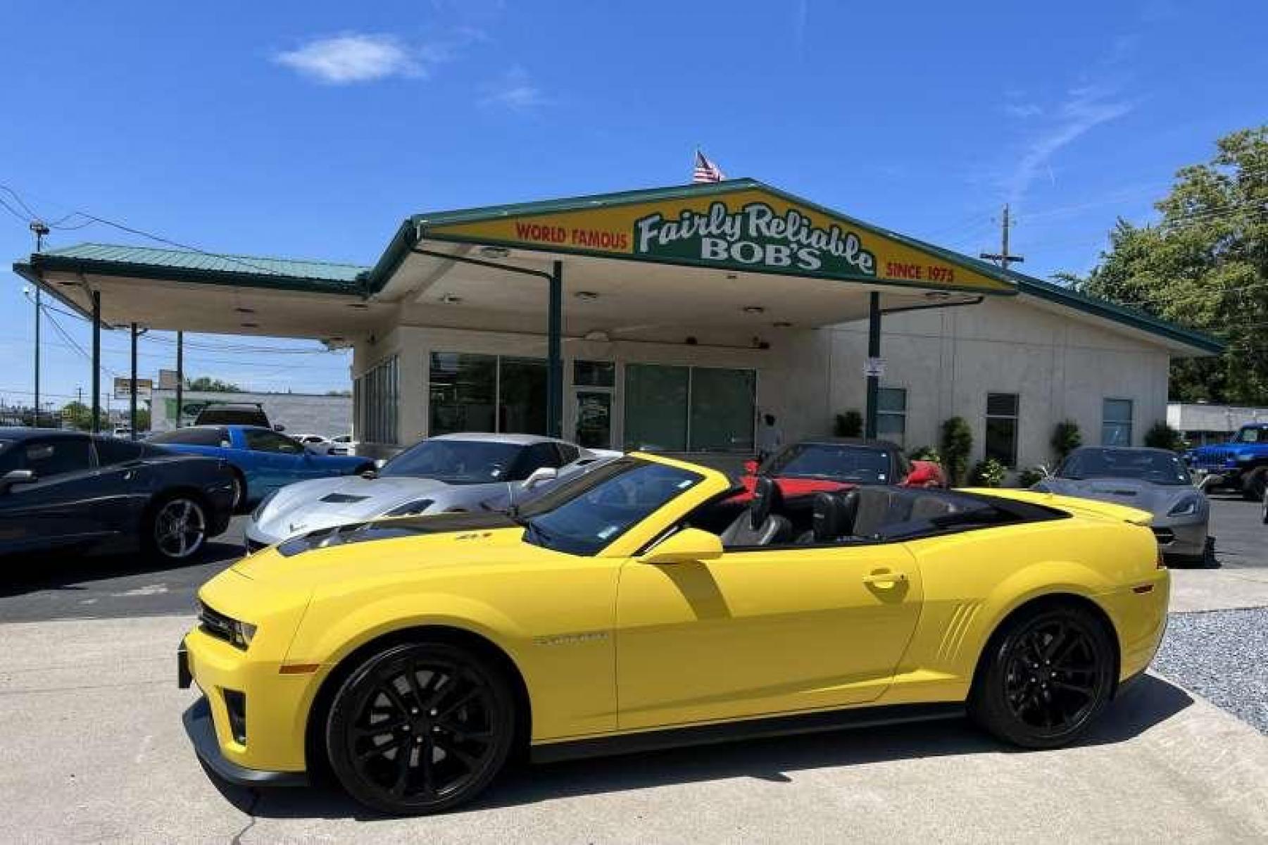 2015 Bright Yellow /Black Chevrolet Camaro ZL-1 Convertible (2G1FM3DP7F9) with an V8 6.2 Liter Supercharged engine, Automatic transmission, located at 2304 W. Main St., Boise, ID, 83702, (208) 342-7777, 43.622105, -116.218658 - Photo #0