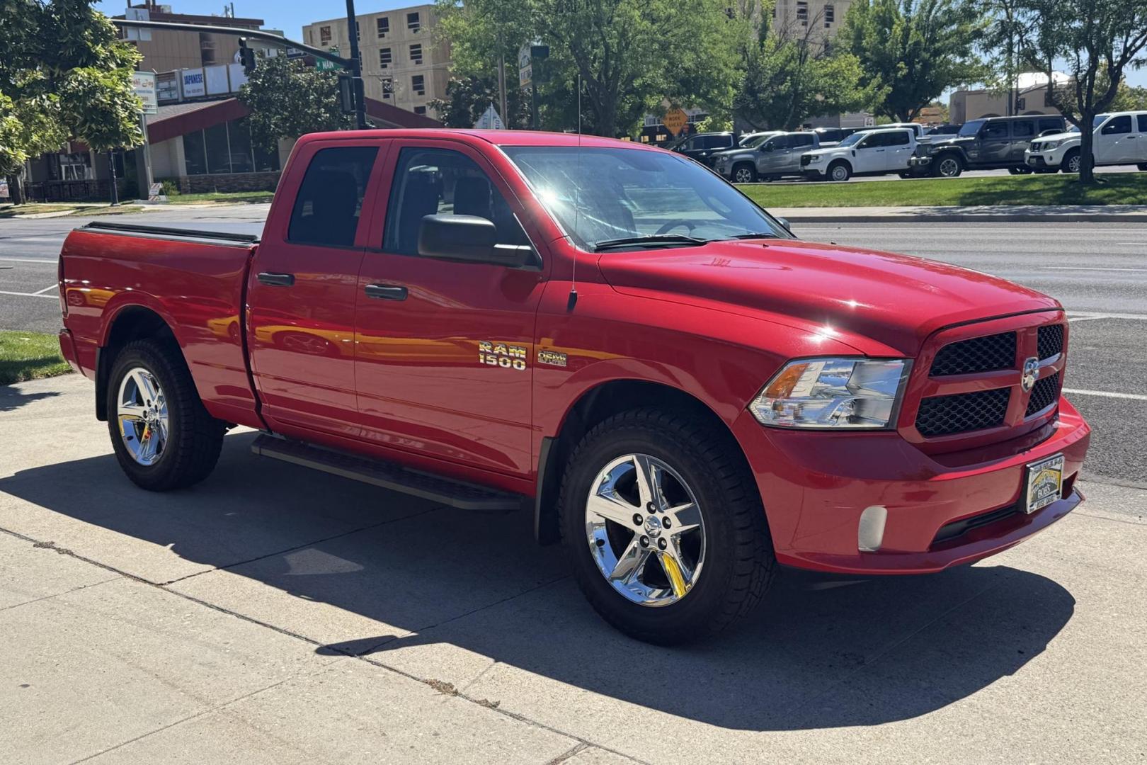 2017 Flame Red /Gray RAM 1500 Quad Cab Express (1C6RR7FT8HS) with an V8 5.7 Liter Hemi engine, Automatic 8 Speed transmission, located at 2304 W. Main St., Boise, ID, 83702, (208) 342-7777, 43.622105, -116.218658 - Low miles! Ready to go! - Photo#2