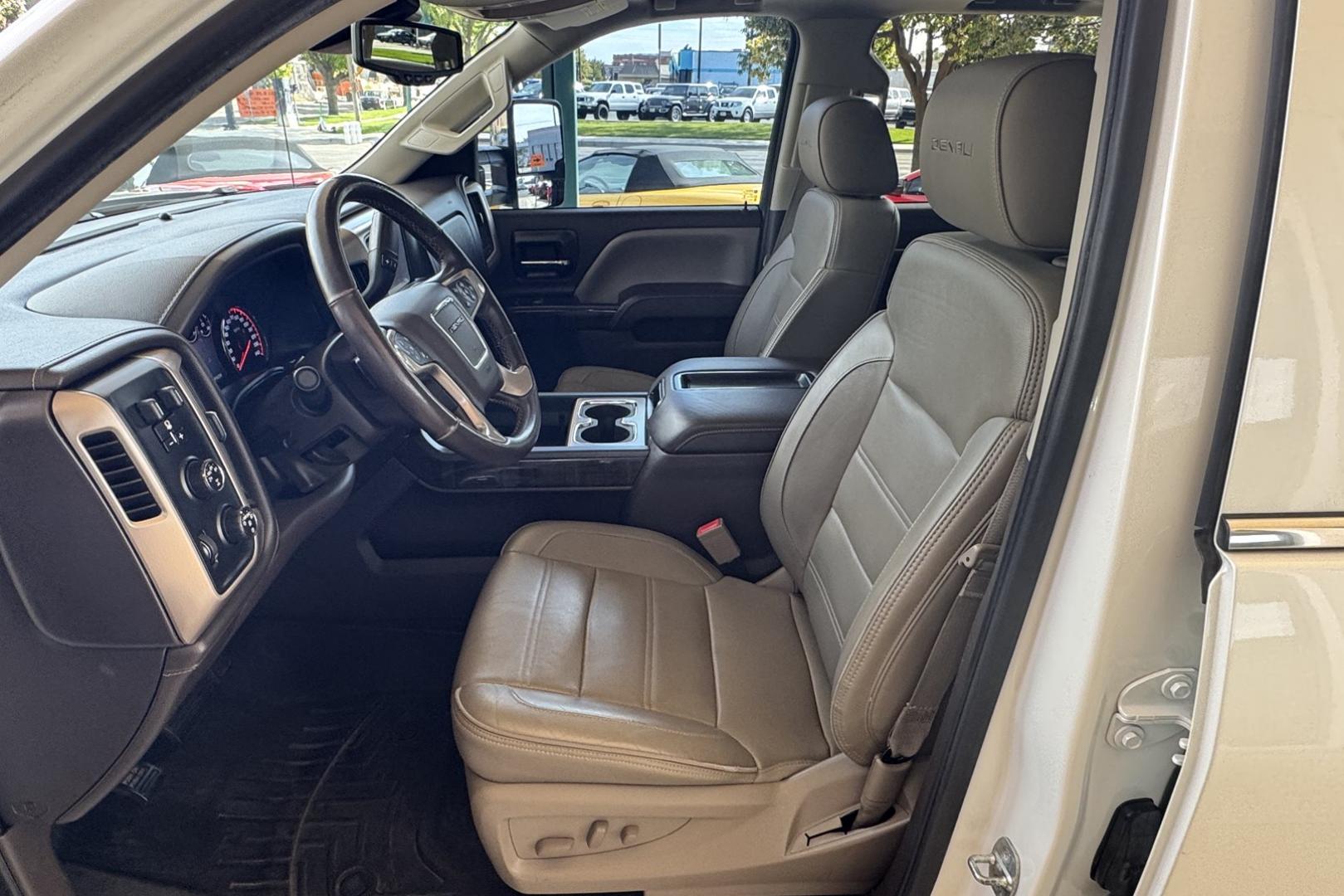 2014 White Diamond /Tan GMC Sierra Denali (3GTU2WEJ8EG) with an V8 6.2 Liter engine, Automatic 6 Speed transmission, located at 2304 W. Main St., Boise, ID, 83702, (208) 342-7777, 43.622105, -116.218658 - Stunning Truck! New Tires Too! - Photo#8