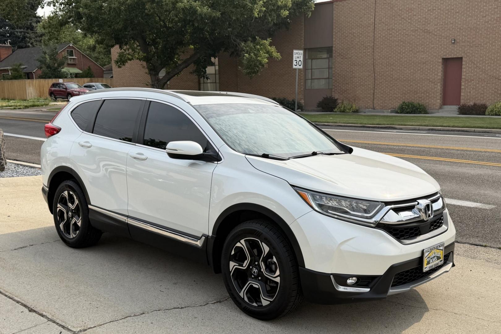 2018 White Diamond Pearl /Tan Honda CR-V Touring (2HKRW2H93JH) with an 4 Cyl 1.5 liter Turbo-Charged engine, Automatic transmission, located at 2304 W. Main St., Boise, ID, 83702, (208) 342-7777, 43.622105, -116.218658 - Highly Optioned And Clean!- Photo#2