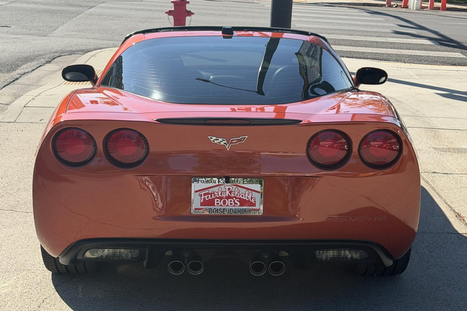 2005 Daytona Sunset Orange /Black Chevrolet Corvette Coupe (1G1YY24U455) with an V8 6.0 liter engine, Automatic transmission, located at 2304 W. Main St., Boise, ID, 83702, (208) 342-7777, 43.622105, -116.218658 - Rare And Beautiful Daytona Sunset Orange! Very Low Mileage And New Tires Too!- Photo#1