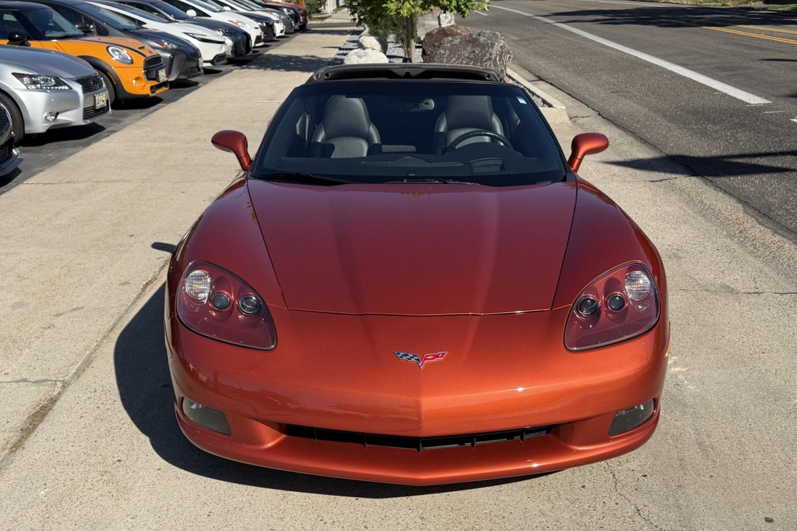 2005 Daytona Sunset Orange /Black Chevrolet Corvette Coupe (1G1YY24U455) with an V8 6.0 liter engine, Automatic transmission, located at 2304 W. Main St., Boise, ID, 83702, (208) 342-7777, 43.622105, -116.218658 - Rare And Beautiful Daytona Sunset Orange! Very Low Mileage And New Tires Too!- Photo#3