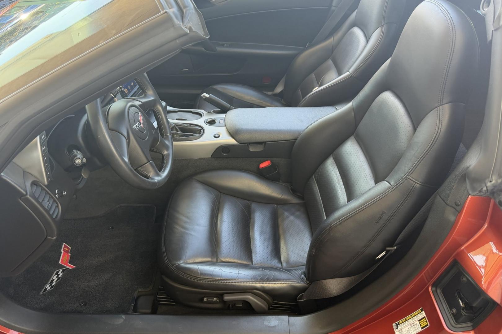 2005 Daytona Sunset Orange /Black Chevrolet Corvette Coupe (1G1YY24U455) with an V8 6.0 liter engine, Automatic transmission, located at 2304 W. Main St., Boise, ID, 83702, (208) 342-7777, 43.622105, -116.218658 - Rare And Beautiful Daytona Sunset Orange! Very Low Mileage And New Tires Too!- Photo#7