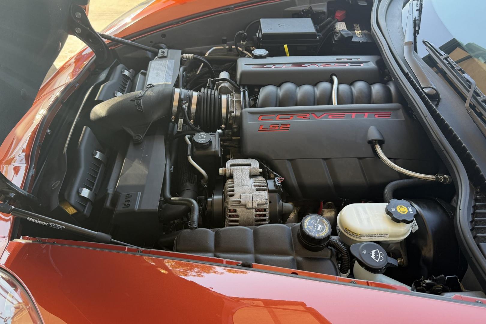 2005 Daytona Sunset Orange /Black Chevrolet Corvette Coupe (1G1YY24U455) with an V8 6.0 liter engine, Automatic transmission, located at 2304 W. Main St., Boise, ID, 83702, (208) 342-7777, 43.622105, -116.218658 - Rare And Beautiful Daytona Sunset Orange! Very Low Mileage And New Tires Too!- Photo#9