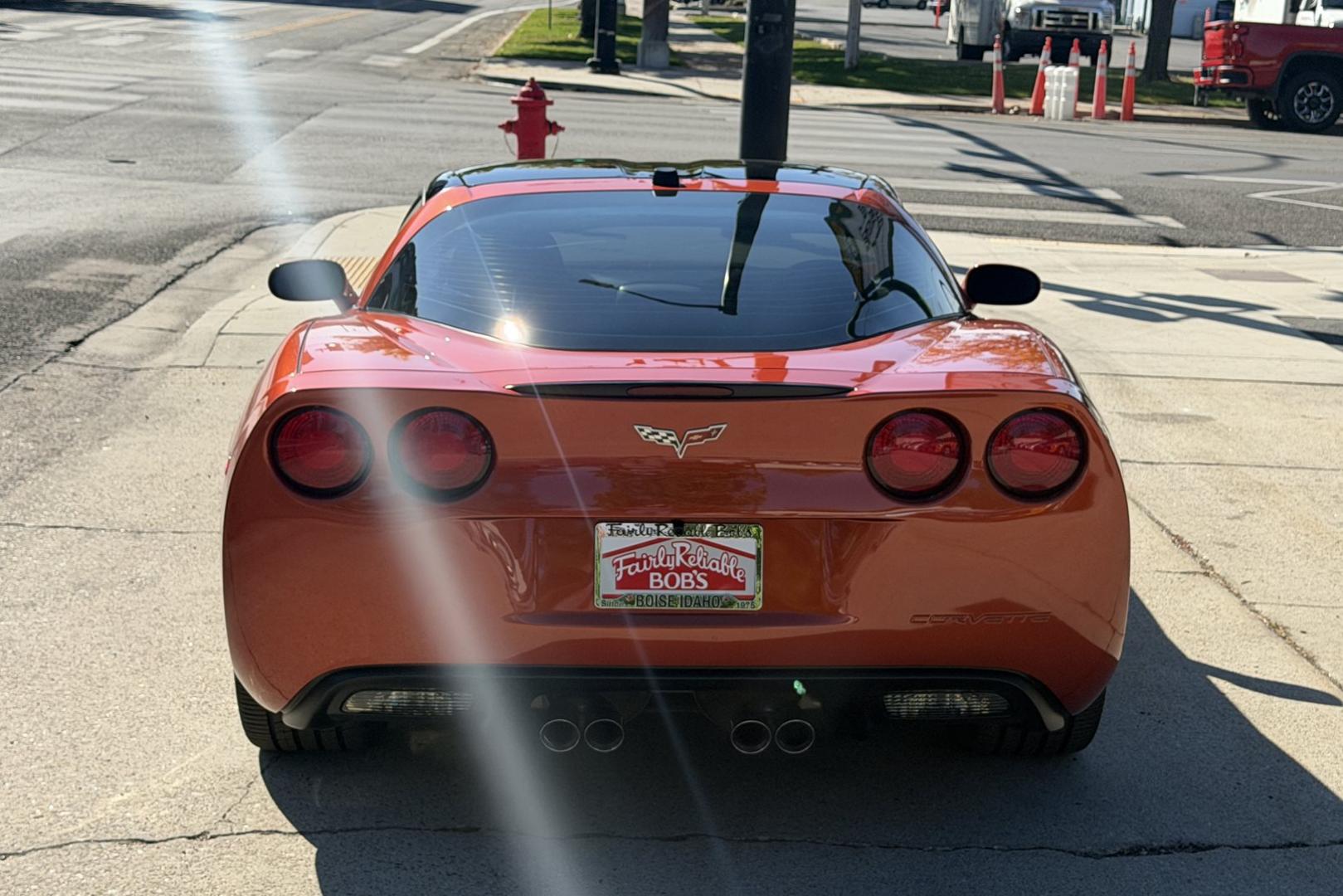 2005 Daytona Sunset Orange /Black Chevrolet Corvette Coupe (1G1YY24U455) with an V8 6.0 liter engine, Automatic transmission, located at 2304 W. Main St., Boise, ID, 83702, (208) 342-7777, 43.622105, -116.218658 - Rare And Beautiful Daytona Sunset Orange! Very Low Mileage And New Tires Too!- Photo#24