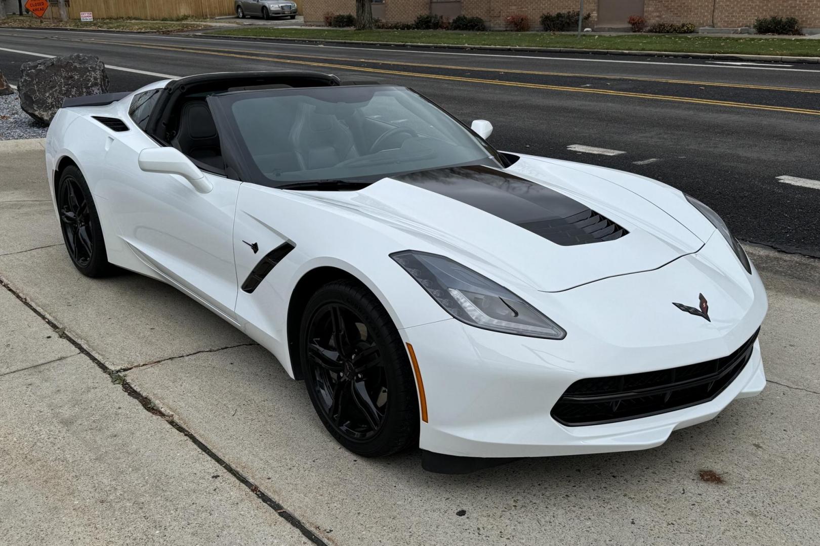 2016 Arctic White /Black Chevrolet Corvette Stingray Coupe (1G1YB2D76G5) with an V8 6.2 liter engine, Automatic 8 Speed transmission, located at 2304 W. Main St., Boise, ID, 83702, (208) 342-7777, 43.622105, -116.218658 - Low miles! Lots of fun! - Photo#2