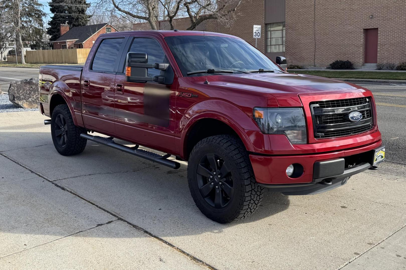 2013 Ruby Red /Black Ford F-150 SuperCrew FX4 (1FTFW1ET7DF) with an V6 3.5 Liter Twin Turbo engine, Automatic 6 Speed transmission, located at 2304 W. Main St., Boise, ID, 83702, (208) 342-7777, 43.622105, -116.218658 - Photo#2