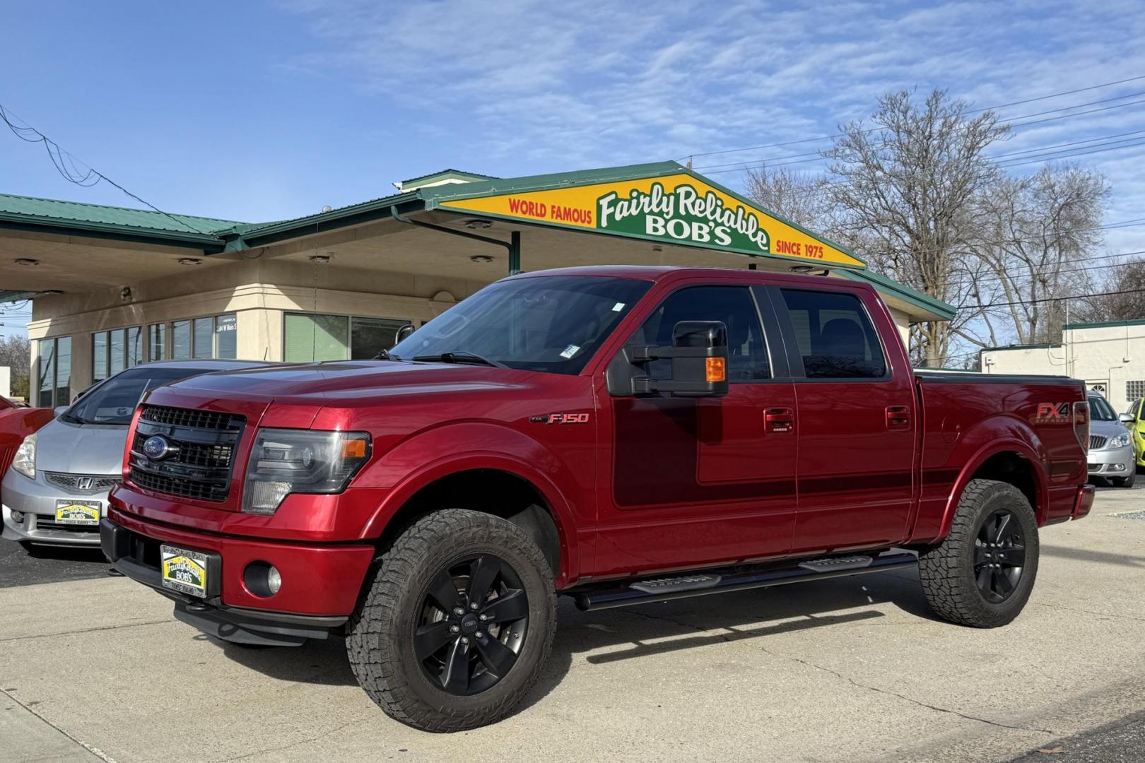 2013 Ruby Red /Black Ford F-150 SuperCrew FX4 (1FTFW1ET7DF) with an V6 3.5 Liter Twin Turbo engine, Automatic 6 Speed transmission, located at 2304 W. Main St., Boise, ID, 83702, (208) 342-7777, 43.622105, -116.218658 - Photo#0