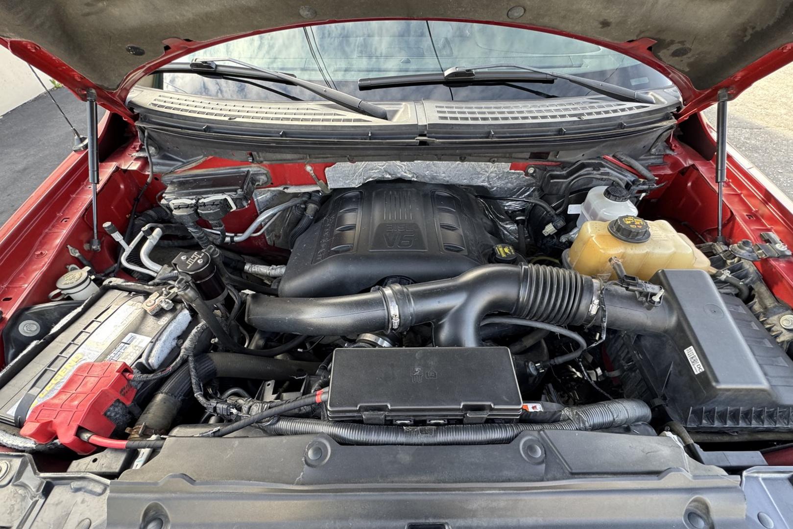 2013 Ruby Red /Black Ford F-150 SuperCrew FX4 (1FTFW1ET7DF) with an V6 3.5 Liter Twin Turbo engine, Automatic 6 Speed transmission, located at 2304 W. Main St., Boise, ID, 83702, (208) 342-7777, 43.622105, -116.218658 - Photo#17
