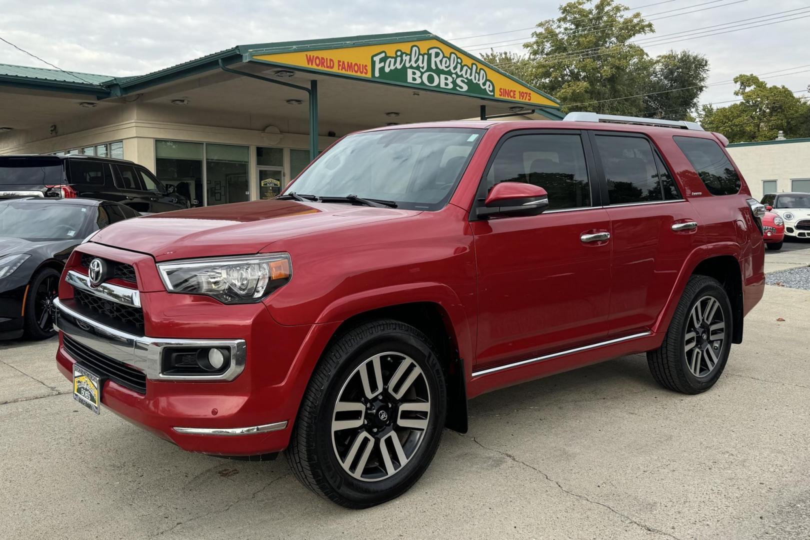 2014 Barcelona Red Metallic /Sand Beige Toyota 4Runner Limited (JTEBU5JR6E5) with an V6 4.0 liter engine, Automatic transmission, located at 2304 W. Main St., Boise, ID, 83702, (208) 342-7777, 43.622105, -116.218658 - Hard To Find! Great To Own! - Photo#0