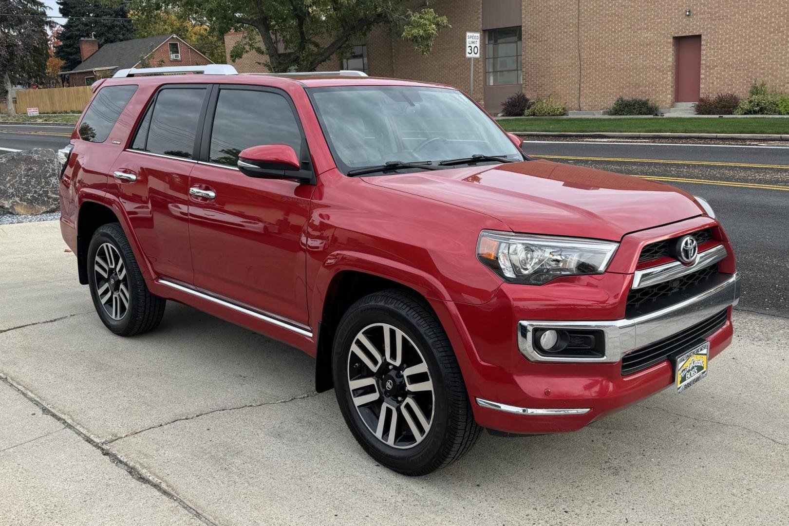 2014 Barcelona Red Metallic /Sand Beige Toyota 4Runner Limited (JTEBU5JR6E5) with an V6 4.0 liter engine, Automatic transmission, located at 2304 W. Main St., Boise, ID, 83702, (208) 342-7777, 43.622105, -116.218658 - Hard To Find! Great To Own! - Photo#1