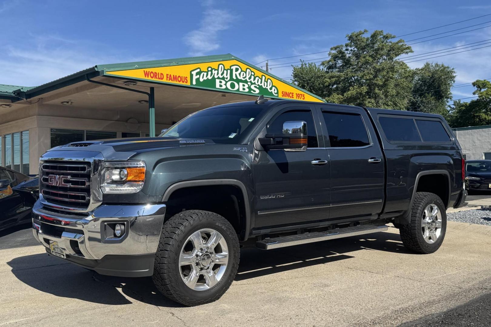 2018 Dark Slate Metallic /Black GMC Sierra 2500HD SLT (1GT12TEY5JF) with an V8 6.6 Liter Turbo Diesel engine, Automatic 6 Speed With Overdrive Allison transmission, located at 2304 W. Main St., Boise, ID, 83702, (208) 342-7777, 43.622105, -116.218658 - Low miles! Sharp Truck! - Photo#0