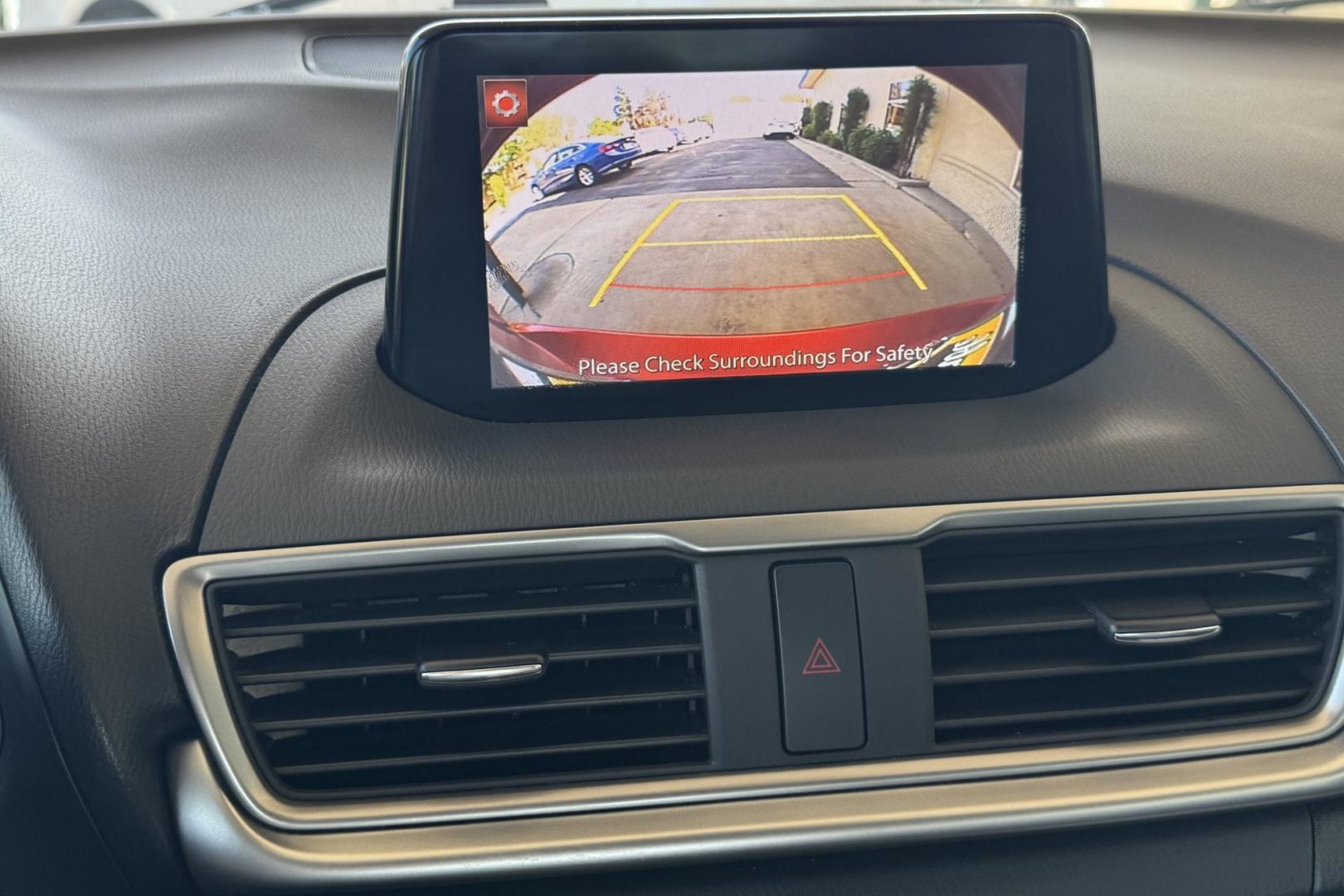2018 Soul Red /Black Mazda Mazda3 Touring (3MZBN1V32JM) with an 4 Cyl 2.5 liter engine, Automatic 6 Speed transmission, located at 2304 W. Main St., Boise, ID, 83702, (208) 342-7777, 43.622105, -116.218658 - Financing Available O.A.C. - Photo#4