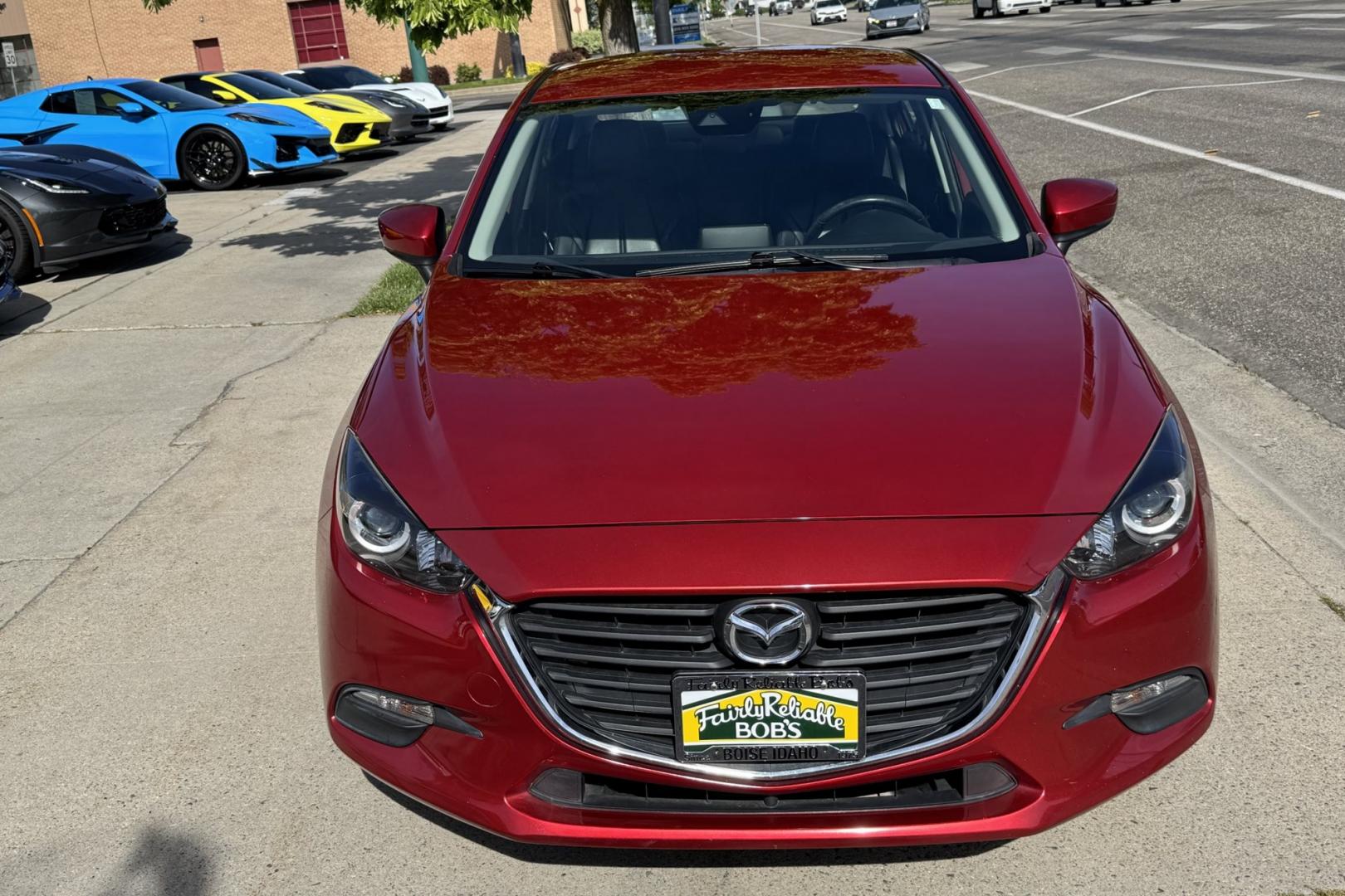 2018 Soul Red /Black Mazda Mazda3 Touring (3MZBN1V32JM) with an 4 Cyl 2.5 liter engine, Automatic 6 Speed transmission, located at 2304 W. Main St., Boise, ID, 83702, (208) 342-7777, 43.622105, -116.218658 - Financing Available O.A.C. - Photo#3