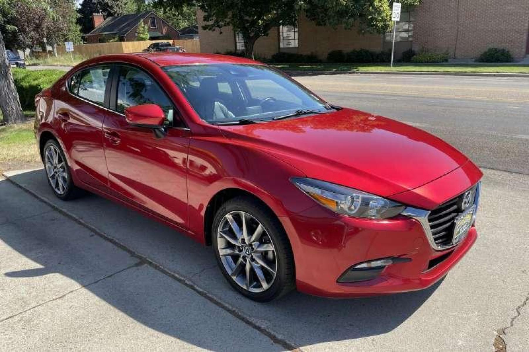 2018 Soul Red /Black Mazda Mazda3 Touring (3MZBN1V32JM) with an 4 Cyl 2.5 liter engine, Automatic transmission, located at 2304 W. Main St., Boise, ID, 83702, (208) 342-7777, 43.622105, -116.218658 - Financing Available O.A.C. - Photo #2