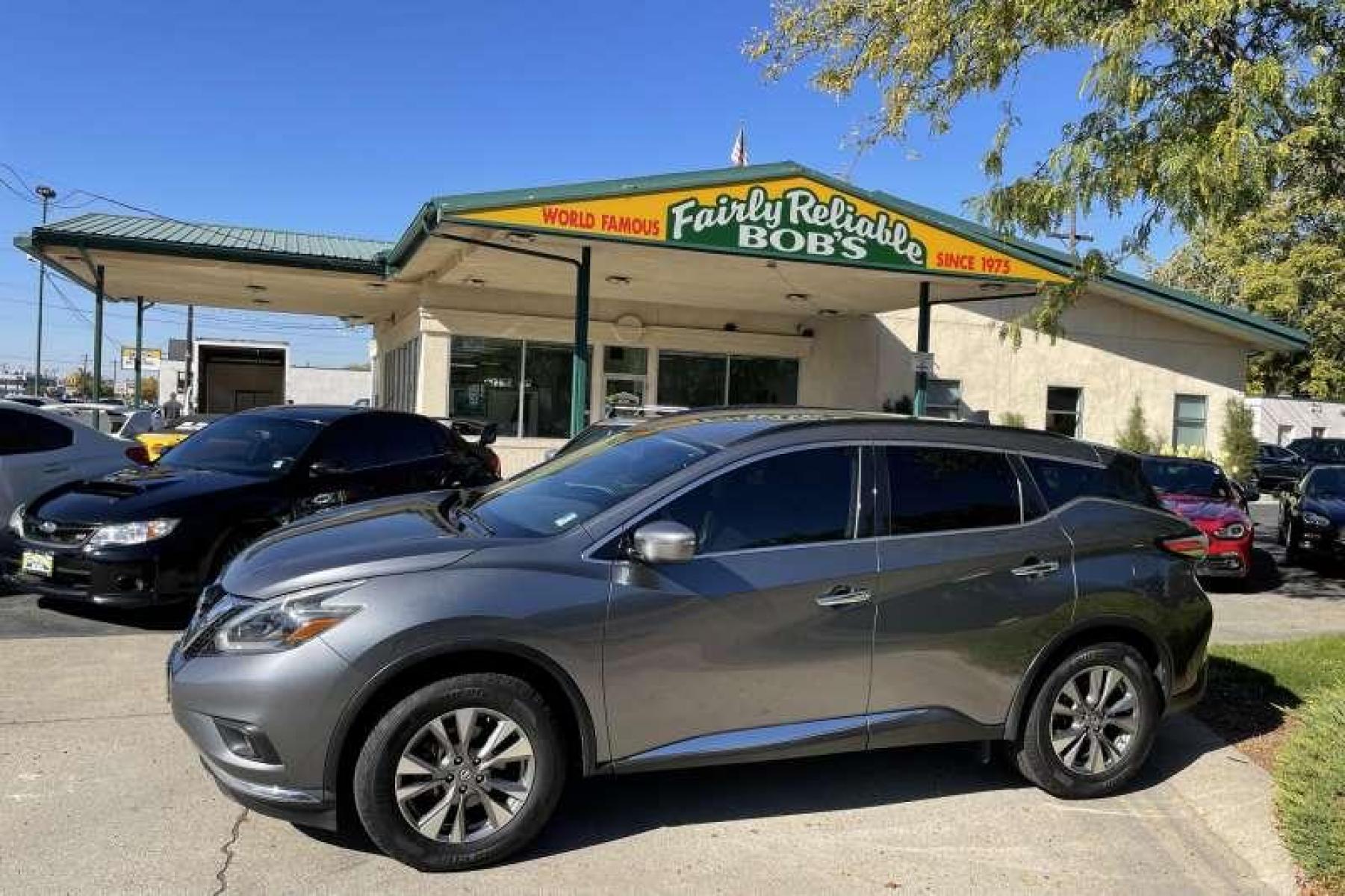 2018 Gun Metallic Gray /Black Nissan Murano SV (5N1AZ2MHXJN) with an V6 3.5 Liter engine, Automatic transmission, located at 2304 W. Main St., Boise, ID, 83702, (208) 342-7777, 43.622105, -116.218658 - Financing Available O.A.C. - Photo #0