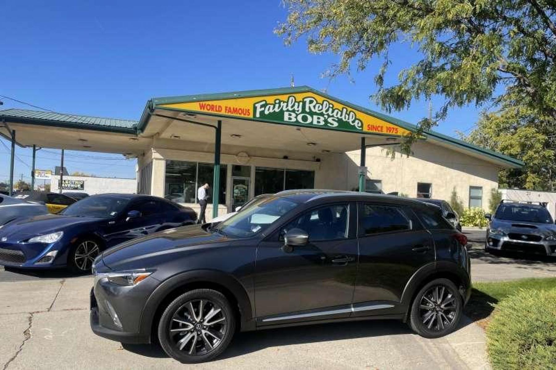 2018 Machine Gray Metallic /Black Mazda CX-3 Grand Touring (JM1DKFD75J0) with an 4 Cyl 2.0 Liter Turbo engine, Automatic transmission, located at 2304 W. Main St., Boise, ID, 83702, (208) 342-7777, 43.622105, -116.218658 - Low miles! Well equipped! Sunroof Too! - Photo #0
