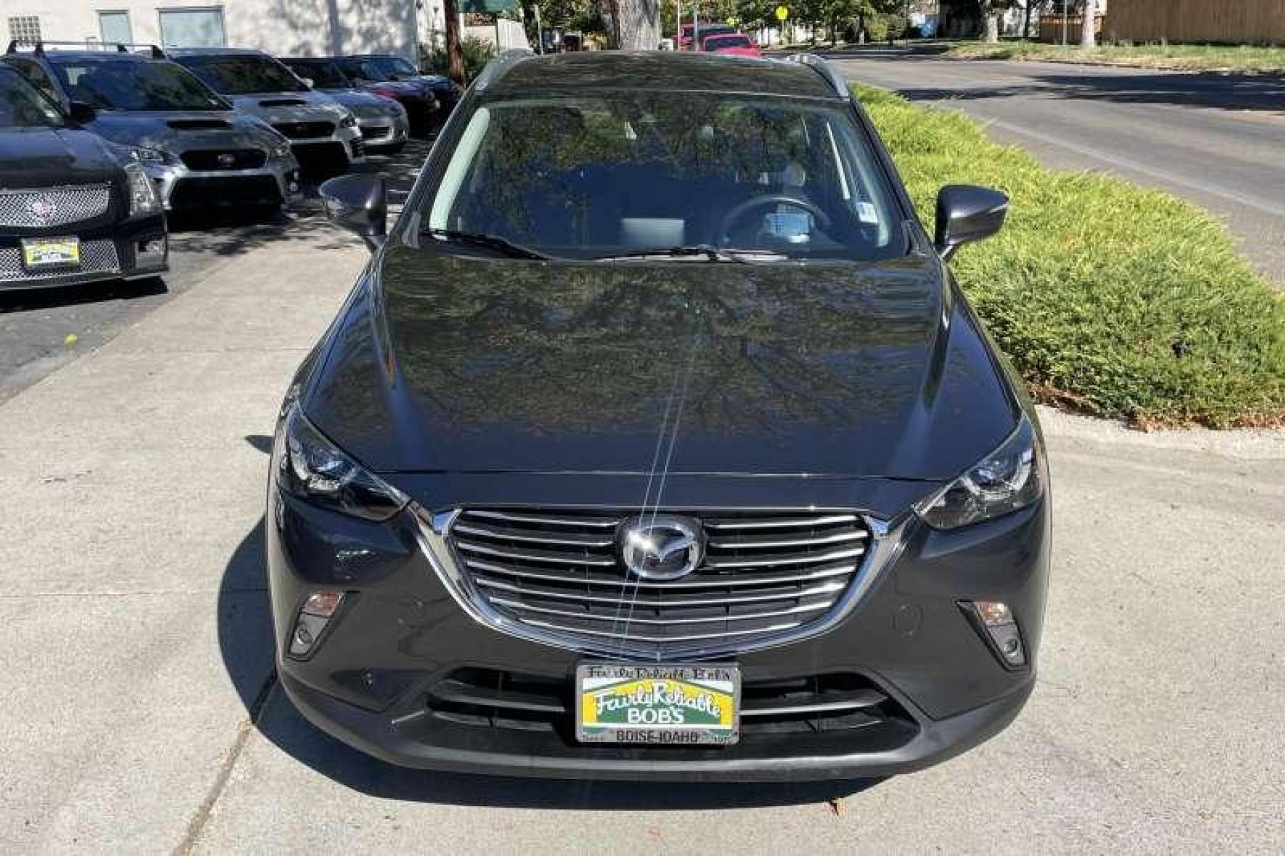 2018 Machine Gray Metallic /Black Mazda CX-3 Grand Touring (JM1DKFD75J0) with an 4 Cyl 2.0 Liter engine, Automatic transmission, located at 2304 W. Main St., Boise, ID, 83702, (208) 342-7777, 43.622105, -116.218658 - Low miles! Well equipped! Sunroof Too! - Photo #1