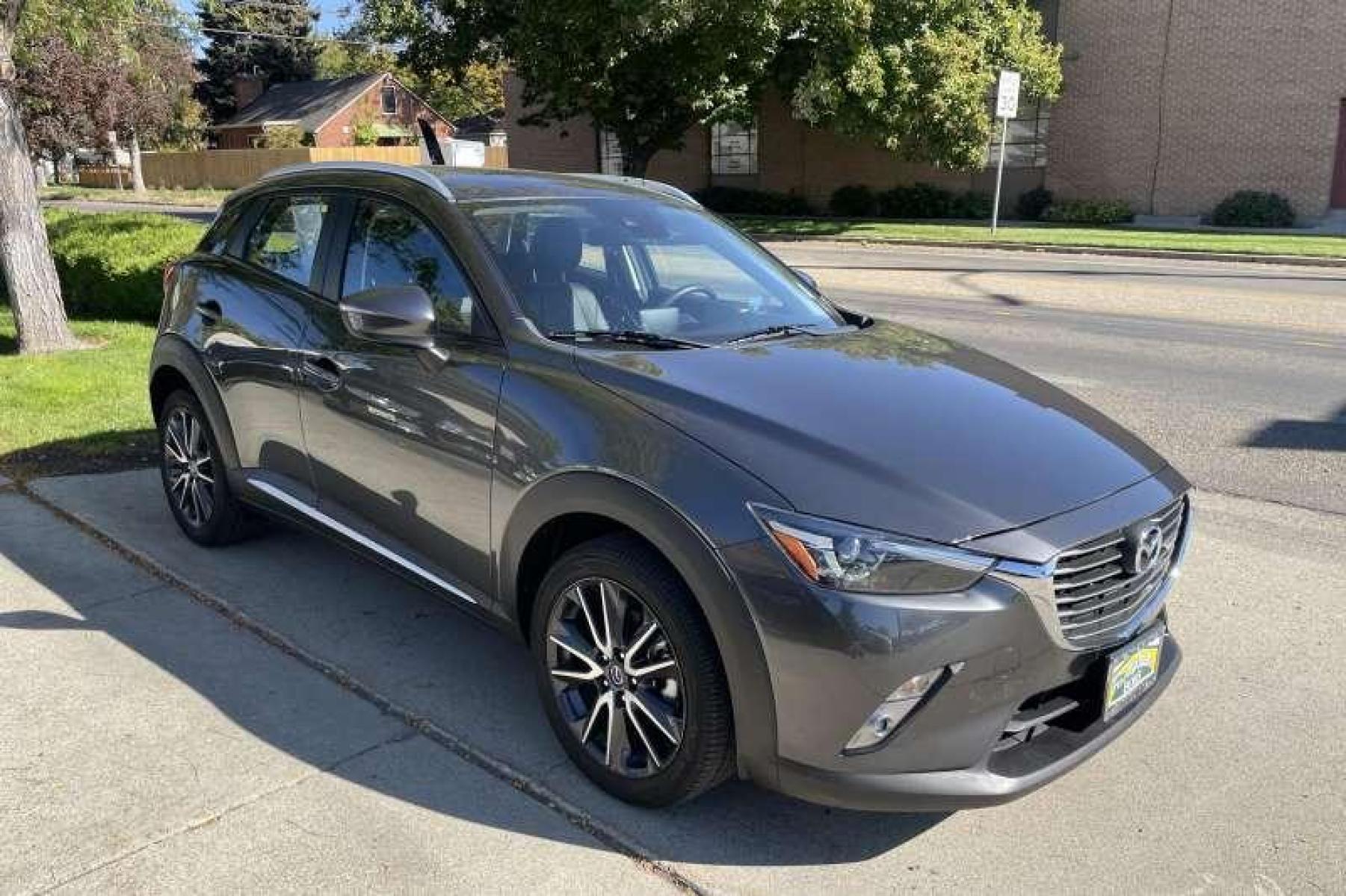 2018 Machine Gray Metallic /Black Mazda CX-3 Grand Touring (JM1DKFD75J0) with an 4 Cyl 2.0 Liter engine, Automatic transmission, located at 2304 W. Main St., Boise, ID, 83702, (208) 342-7777, 43.622105, -116.218658 - Low miles! Well equipped! Sunroof Too! - Photo #2