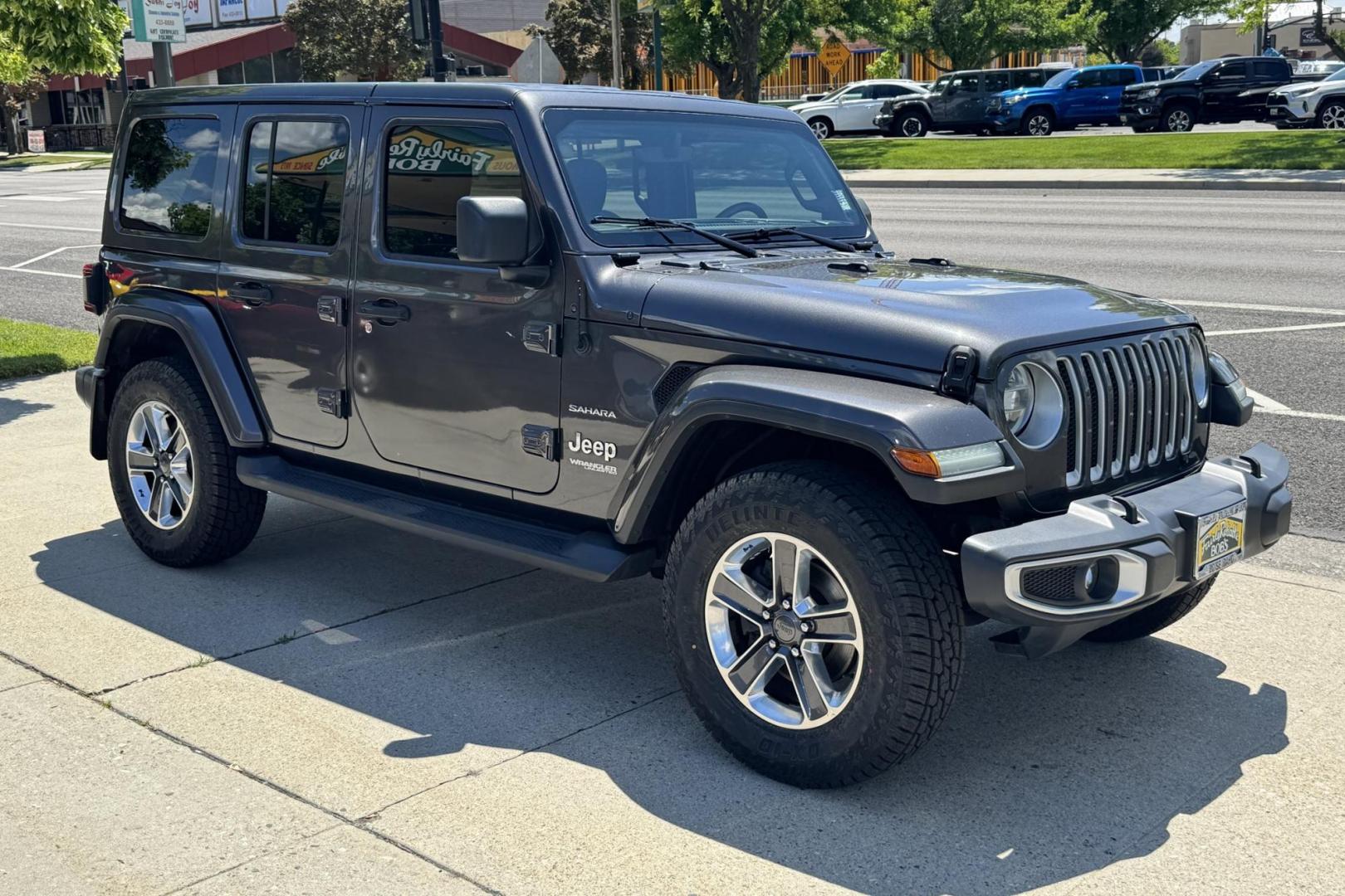 2019 Granite Crystal Metallic /Black Jeep Wrangler Unlimited Sahara (1C4HJXEN0KW) with an 4 Cyl 2.0 liter Turbo-Charged engine, Automatic transmission, located at 2304 W. Main St., Boise, ID, 83702, (208) 342-7777, 43.622105, -116.218658 - Ready For Adventure! - Photo#2