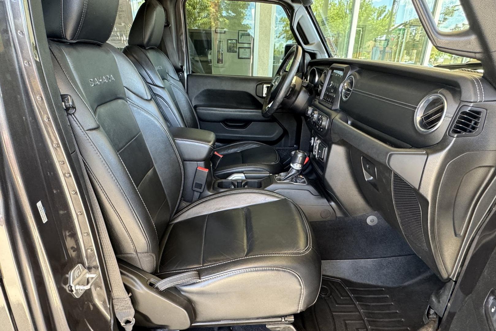 2019 Granite Crystal Metallic /Black Jeep Wrangler Unlimited Sahara (1C4HJXEN0KW) with an 4 Cyl 2.0 liter Turbo-Charged engine, Automatic transmission, located at 2304 W. Main St., Boise, ID, 83702, (208) 342-7777, 43.622105, -116.218658 - Ready For Adventure! - Photo#18