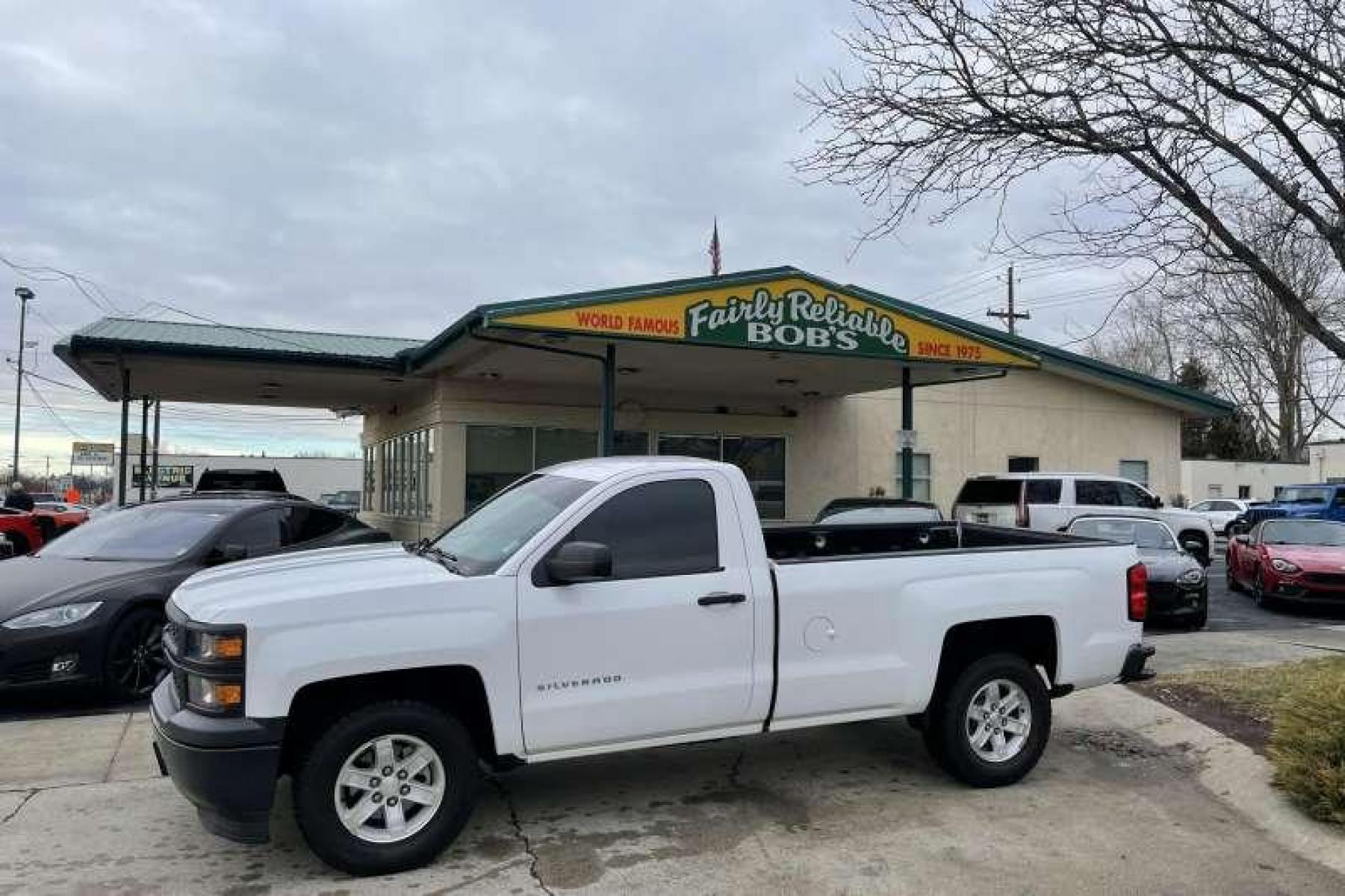 2014 Summit White /Black Chevrolet Silverado 1500 Regular Cab (1GCNCPEH4EZ) with an V6 4.3 Liter engine, Automatic transmission, located at 2304 W. Main St., Boise, ID, 83702, (208) 342-7777, 43.622105, -116.218658 - Photo #0