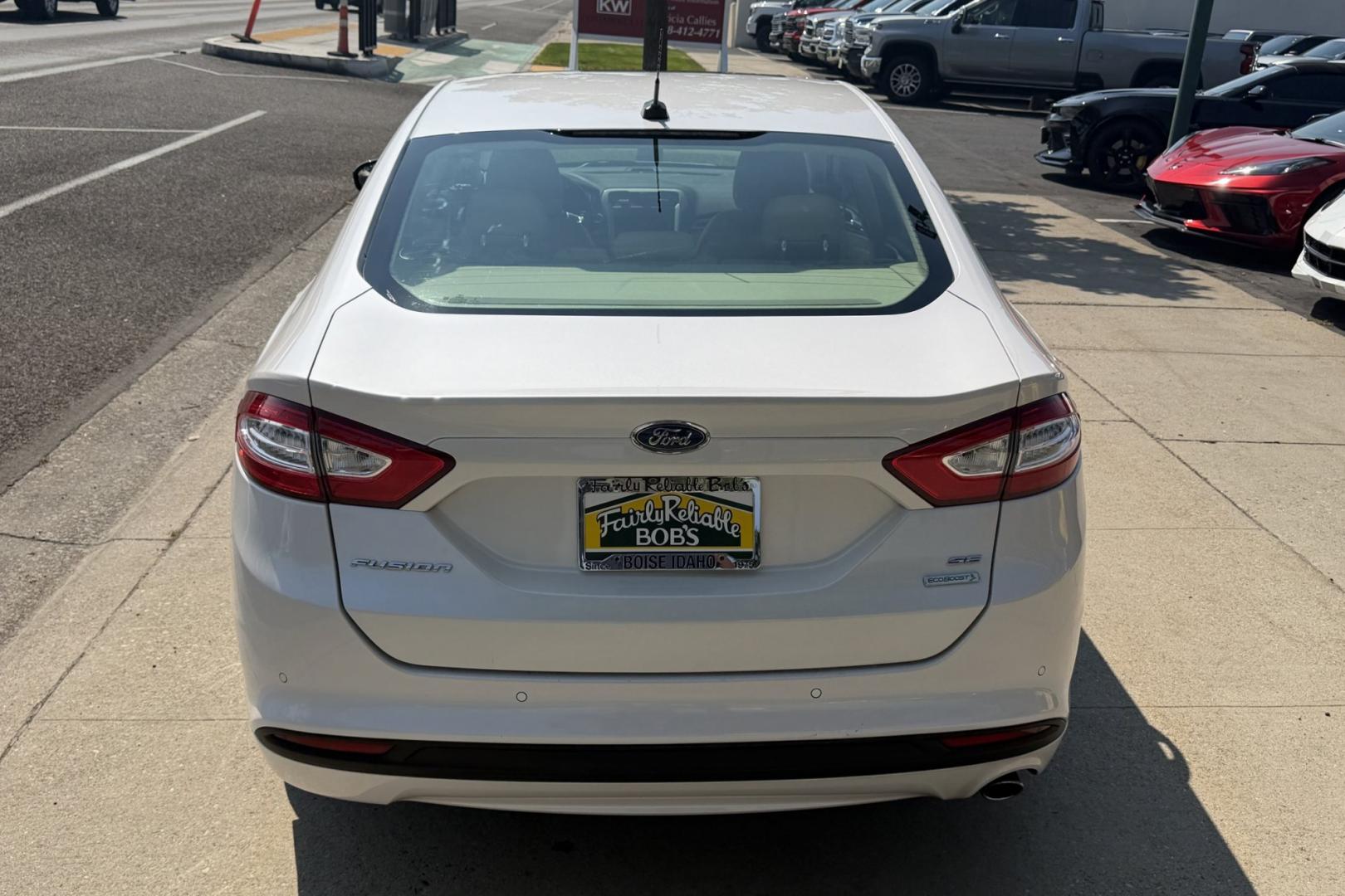 2015 White Platinum /Saddle Ford Fusion SE (3FA6P0HD1FR) with an 4 Cyl 1.5 Liter Turbo engine, Automatic transmission, located at 2304 W. Main St., Boise, ID, 83702, (208) 342-7777, 43.622105, -116.218658 - Well Optioned Fusion! Very Clean, Comfortable And Low Mileage Too!- Photo#1