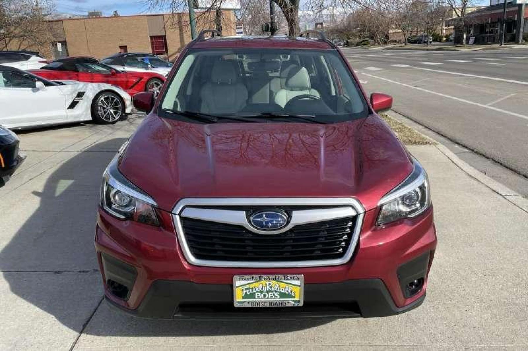2019 Crimson Red Pearl /Tan Subaru Forester 2.5i Premium (JF2SKAGC6KH) with an H4 2.5 Liter engine, Automatic transmission, located at 2304 W. Main St., Boise, ID, 83702, (208) 342-7777, 43.622105, -116.218658 - Financing Available O.A.C. - Photo #1
