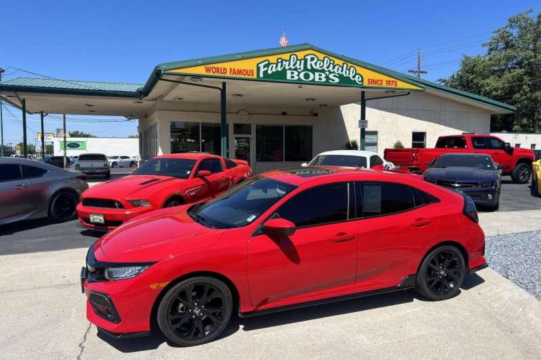 2019 Rallye Red /Black Honda Civic Sport Touring (SHHFK7H99KU) with an 4 Cyl 1.5 Liter Turbo engine, Automatic transmission, located at 2304 W. Main St., Boise, ID, 83702, (208) 342-7777, 43.622105, -116.218658 - Very well equipped! Low miles! - Photo #0
