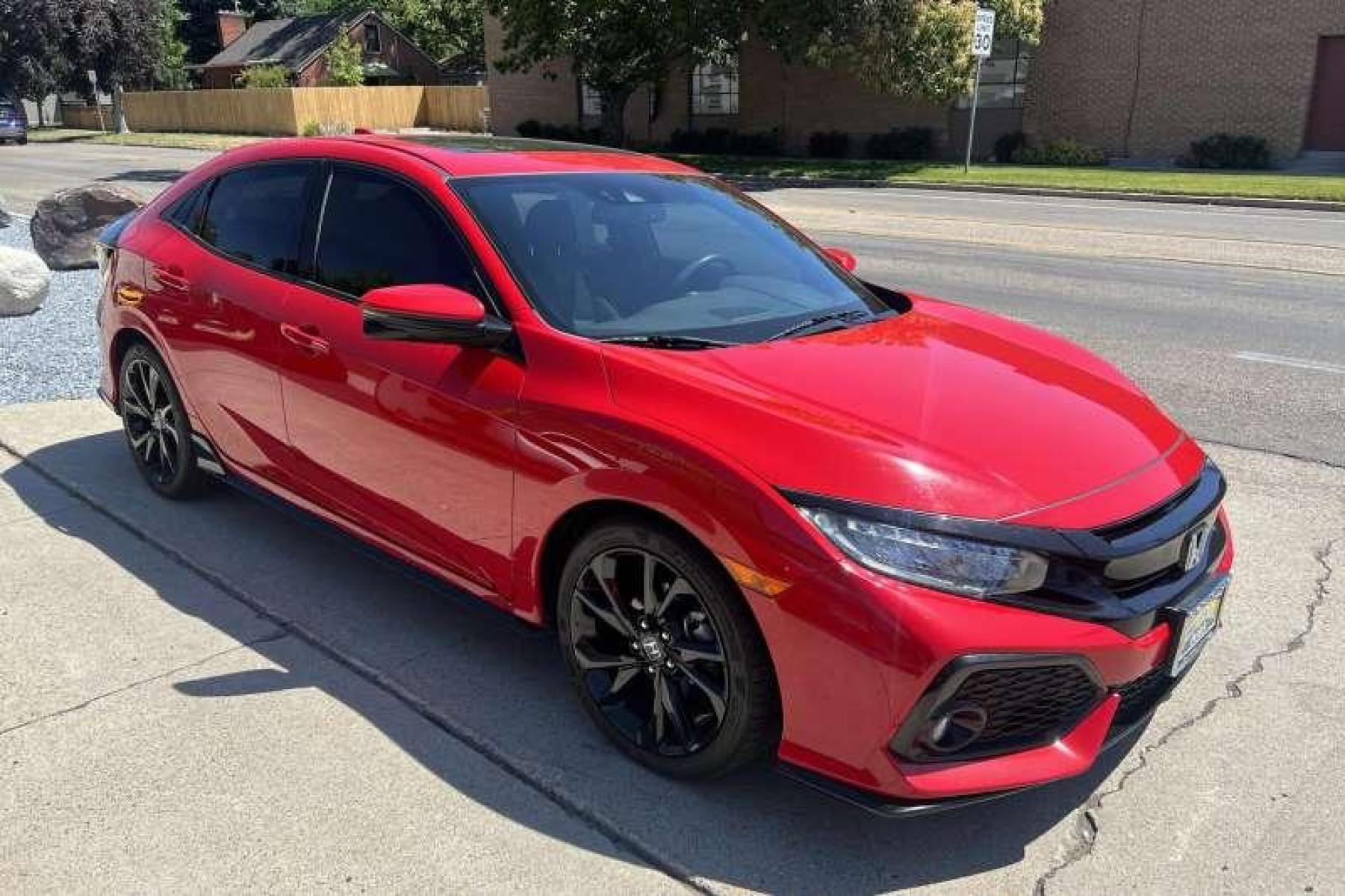 2019 Rallye Red /Black Honda Civic Sport Touring (SHHFK7H99KU) with an 1.5L i4 Turbo engine, Automatic transmission, located at 2304 W. Main St., Boise, ID, 83702, (208) 342-7777, 43.622105, -116.218658 - Financing Available O.A.C. - Photo #2