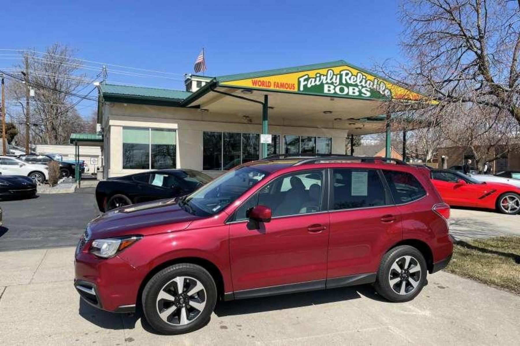 2018 Venetian Red Pearl /Gray Subaru Forester 2.5i Limited (JF2SJARC0JH) with an H4 2.5 Liter engine, Automatic transmission, located at 2304 W. Main St., Boise, ID, 83702, (208) 342-7777, 43.622105, -116.218658 - Financing Available O.A.C. - Photo #0