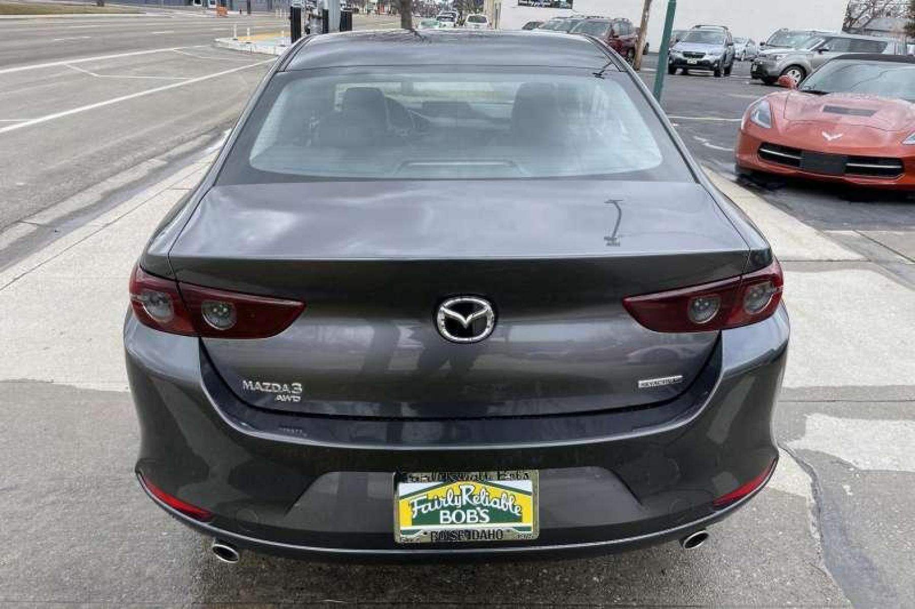 2021 Machine Gray /Black Mazda Mazda3 Select AWD (JM1BPBBL4M1) with an 4 Cyl 2.5 Liter engine, Automatic transmission, located at 2304 W. Main St., Boise, ID, 83702, (208) 342-7777, 43.622105, -116.218658 - Remaining Factory Warranty and All Wheel Drive! - Photo #3
