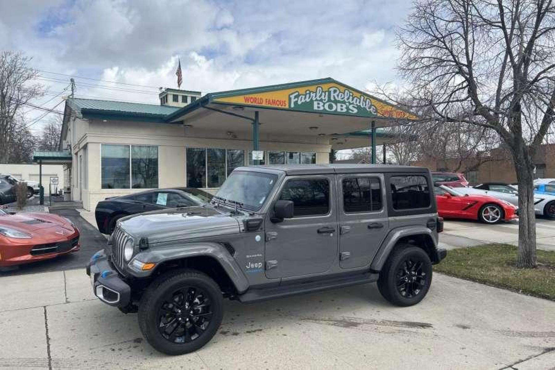 2022 Sting-Ray Gray /Black Jeep Wrangler Unlimited Sahara 4xe (1C4JJXP67NW) with an 4 Cyl 2.0 Liter Hybrid engine, Automatic transmission, located at 2304 W. Main St., Boise, ID, 83702, (208) 342-7777, 43.622105, -116.218658 - Hybrid power Wrangler! Well equipped! - Photo #0